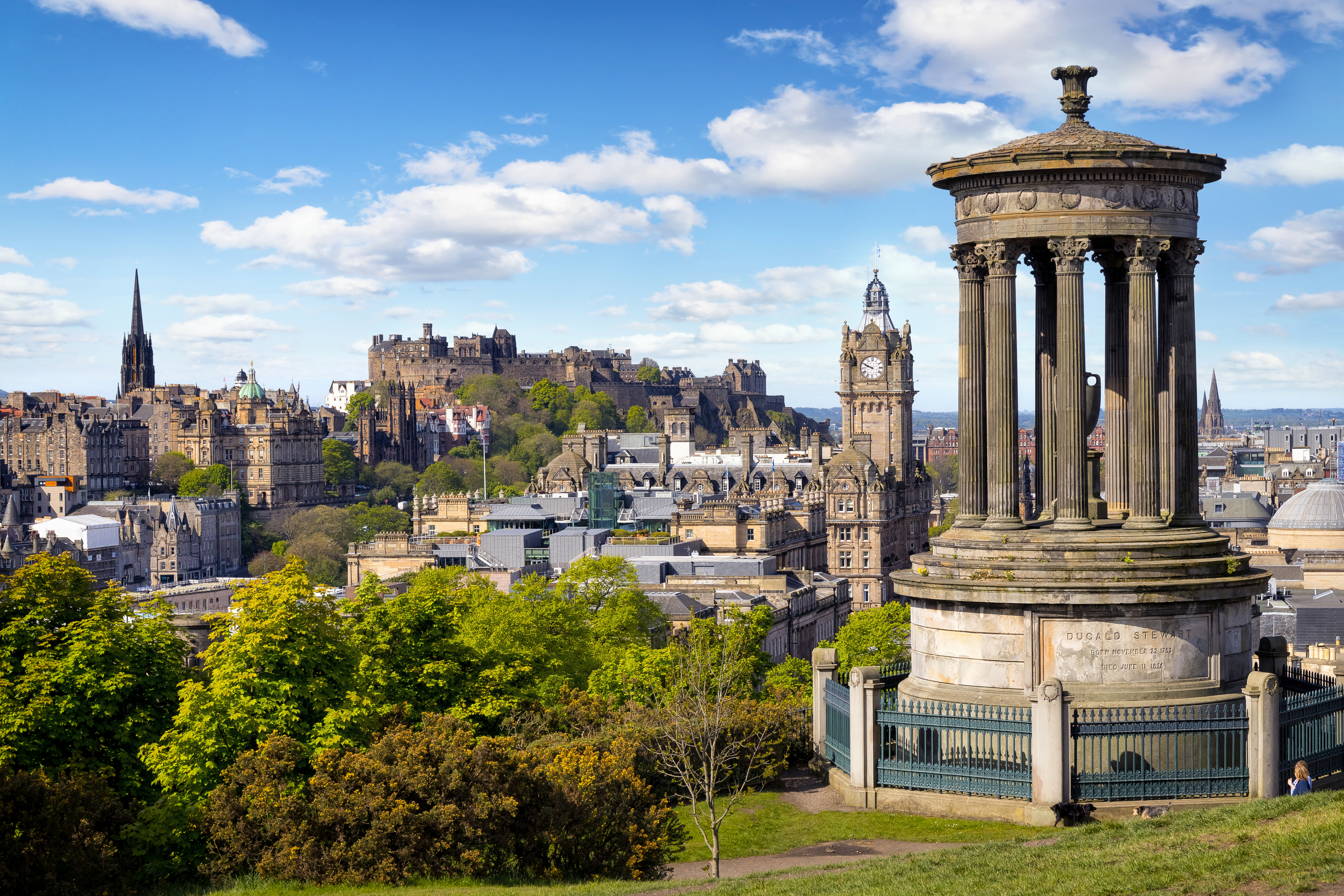 Dugald Stewart Monument and view over historic Edinburgh from Calton Hill