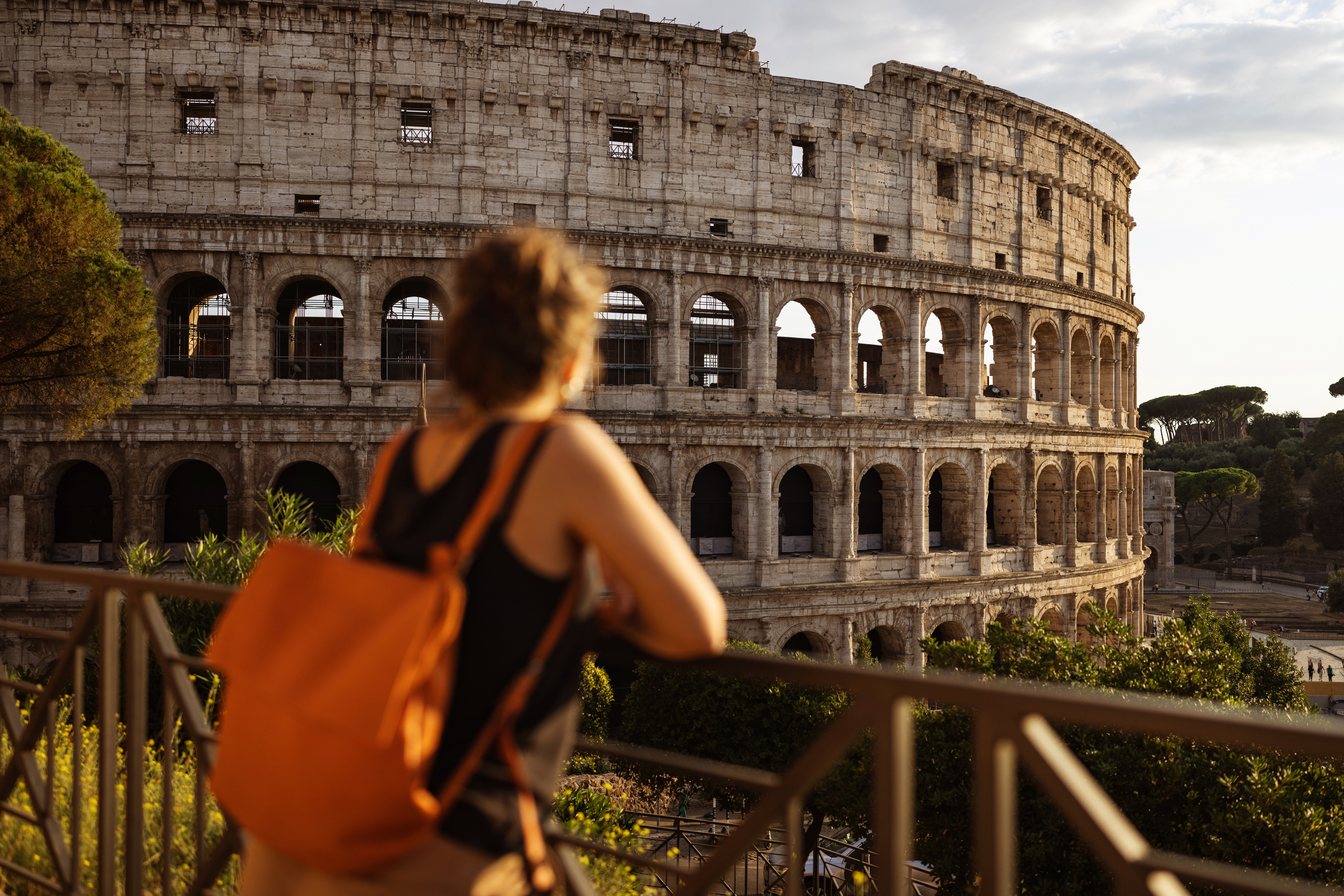 Tourist woman in Rome by the Coliseum