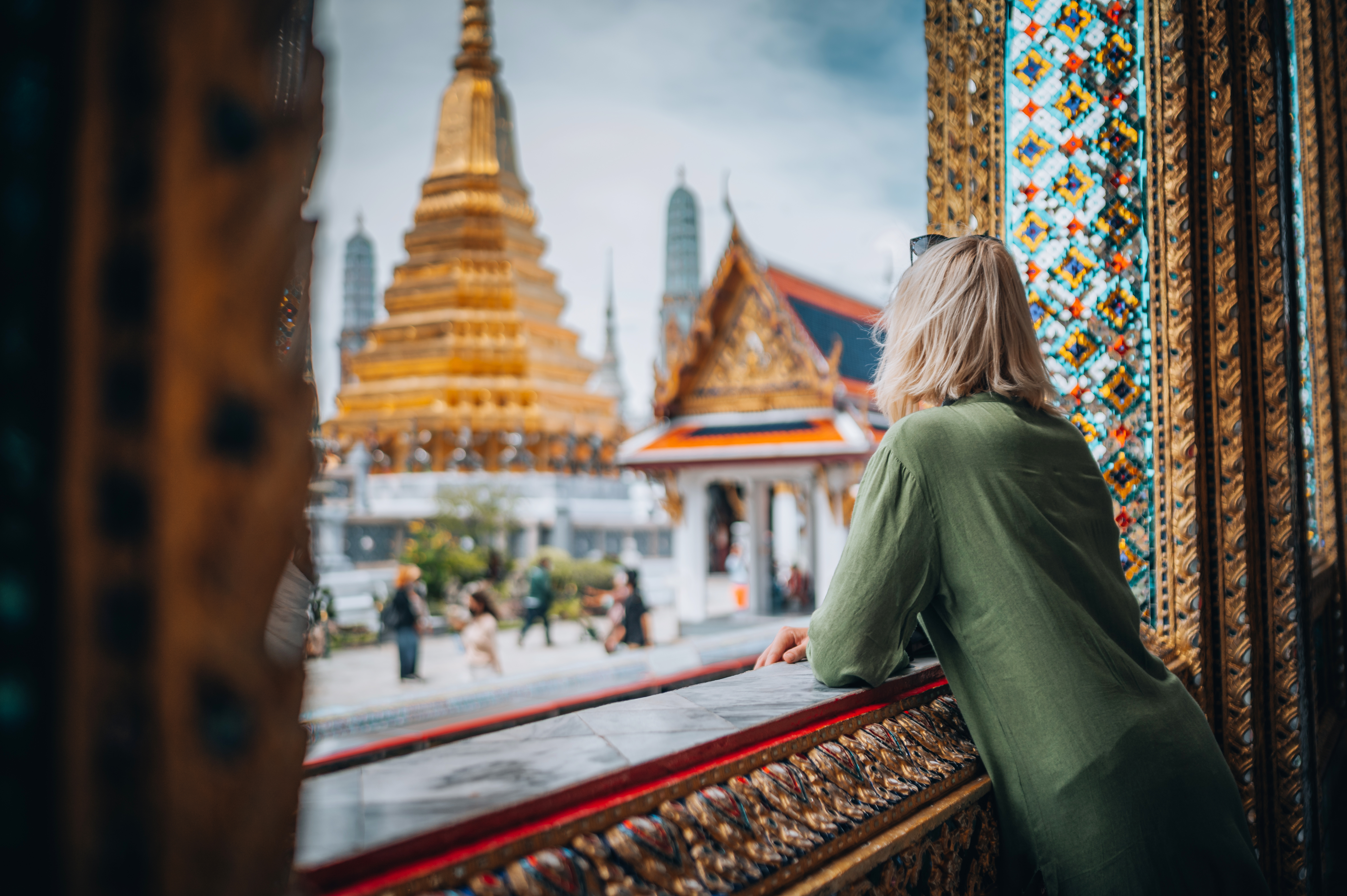 Woman exploring Grand Palace and Wat Phra Kaew in Bangkok, Thailand