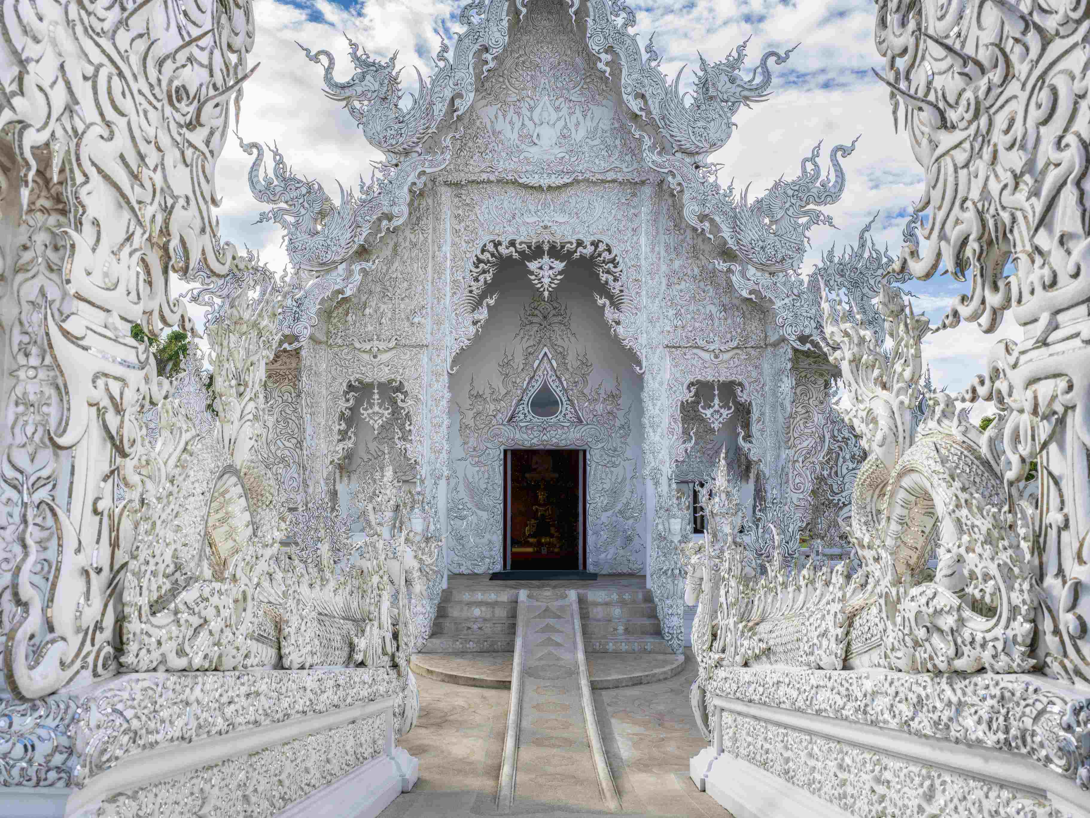 Entrance into the famous buddhist White Temple in Chiang Rai