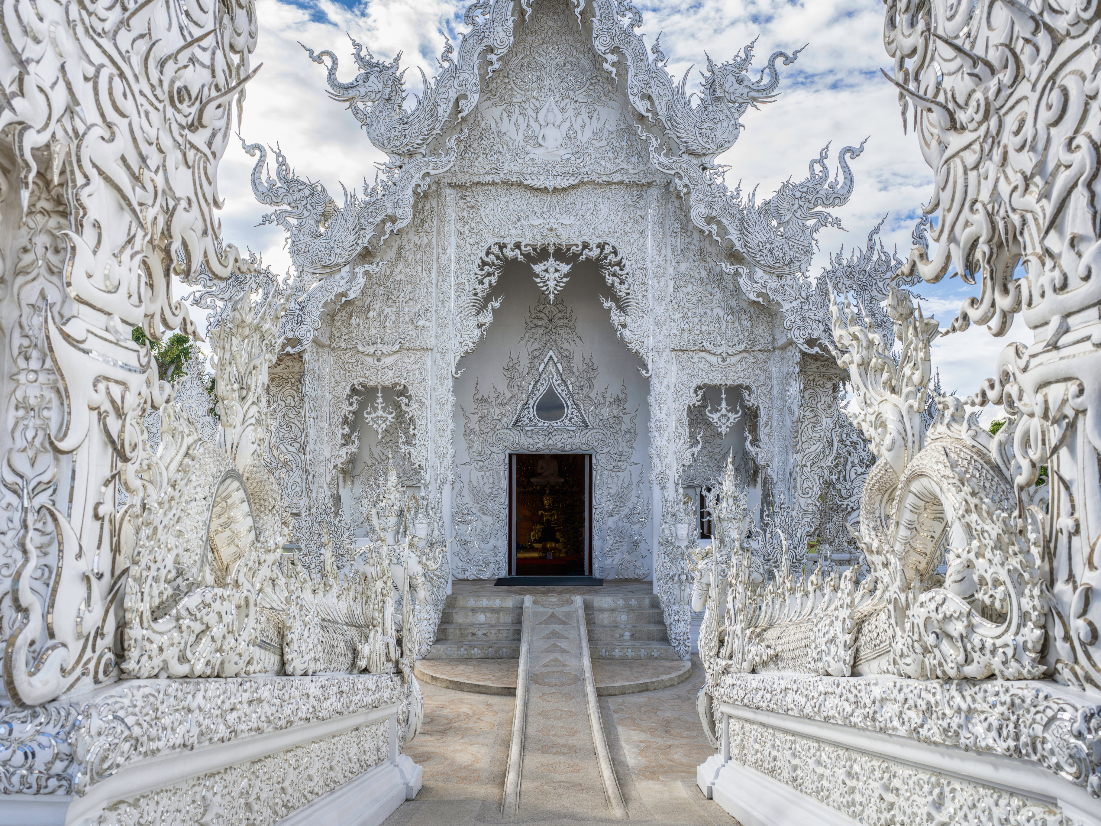 Entrance into the famous buddhist White Temple in Chiang Rai
