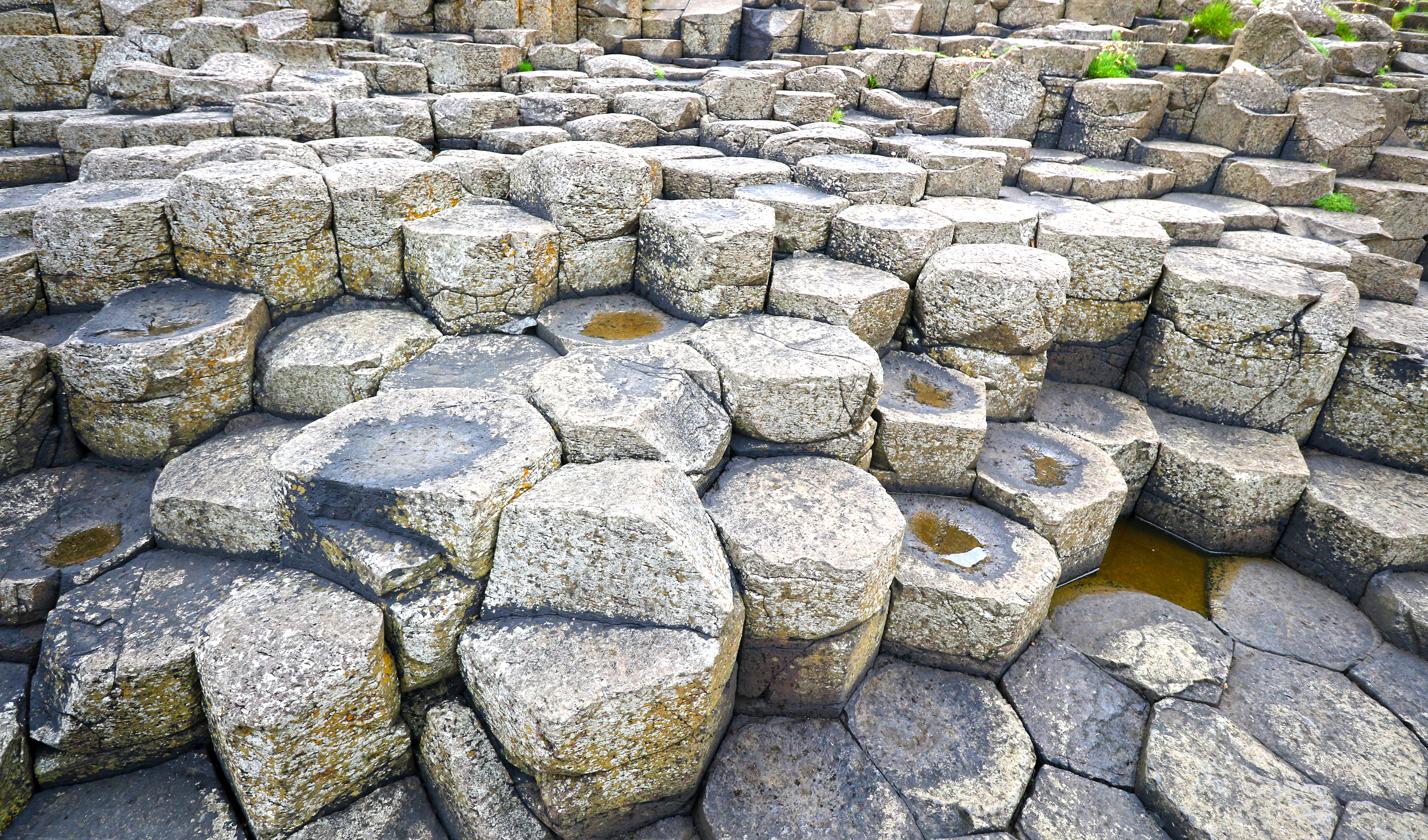 Closeup Patterns of some the forty thousand interlocking basalt columns, natural formations.