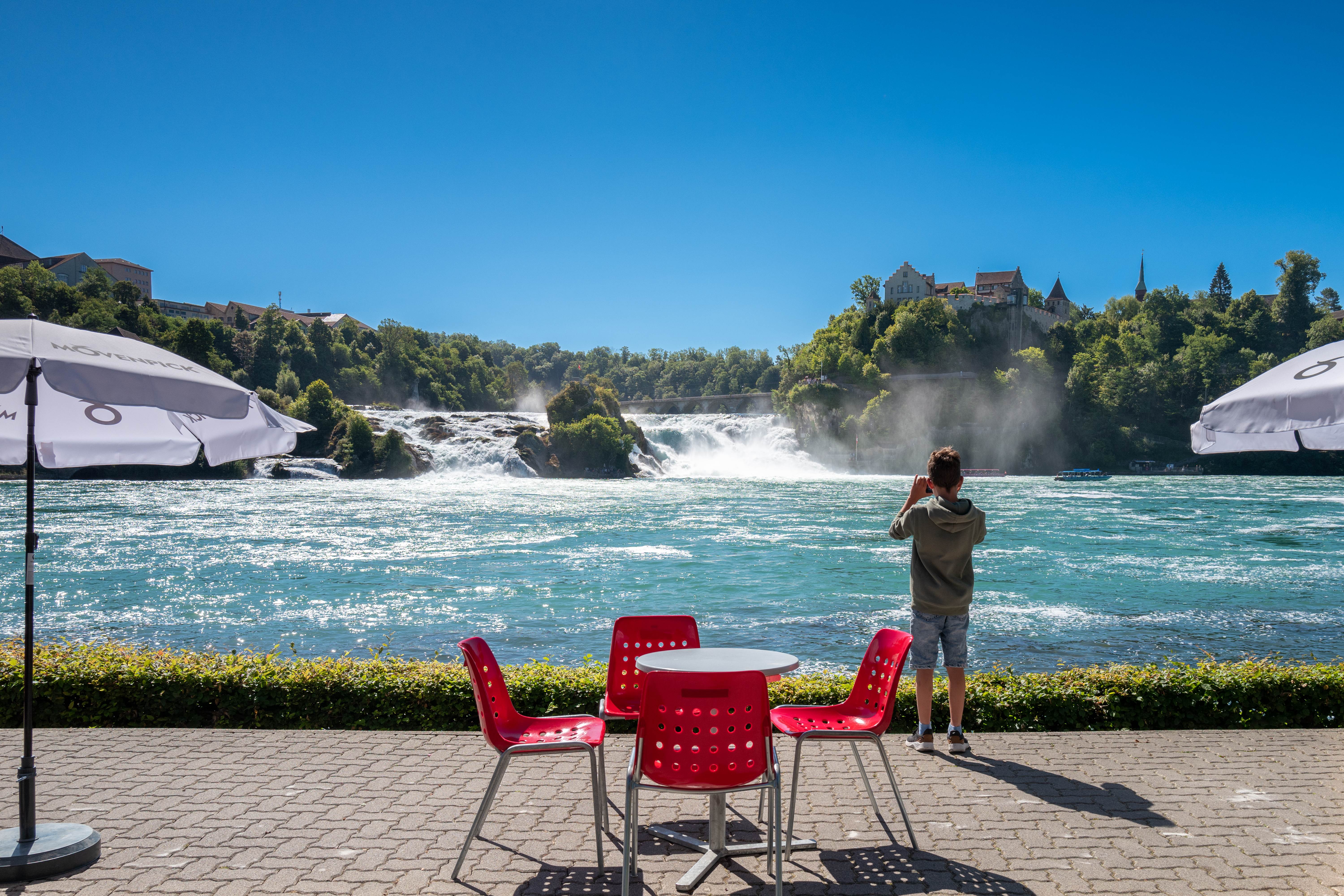 Early morning View of the Rhine Falls and Rhine River from the Schaffhausen promenade.