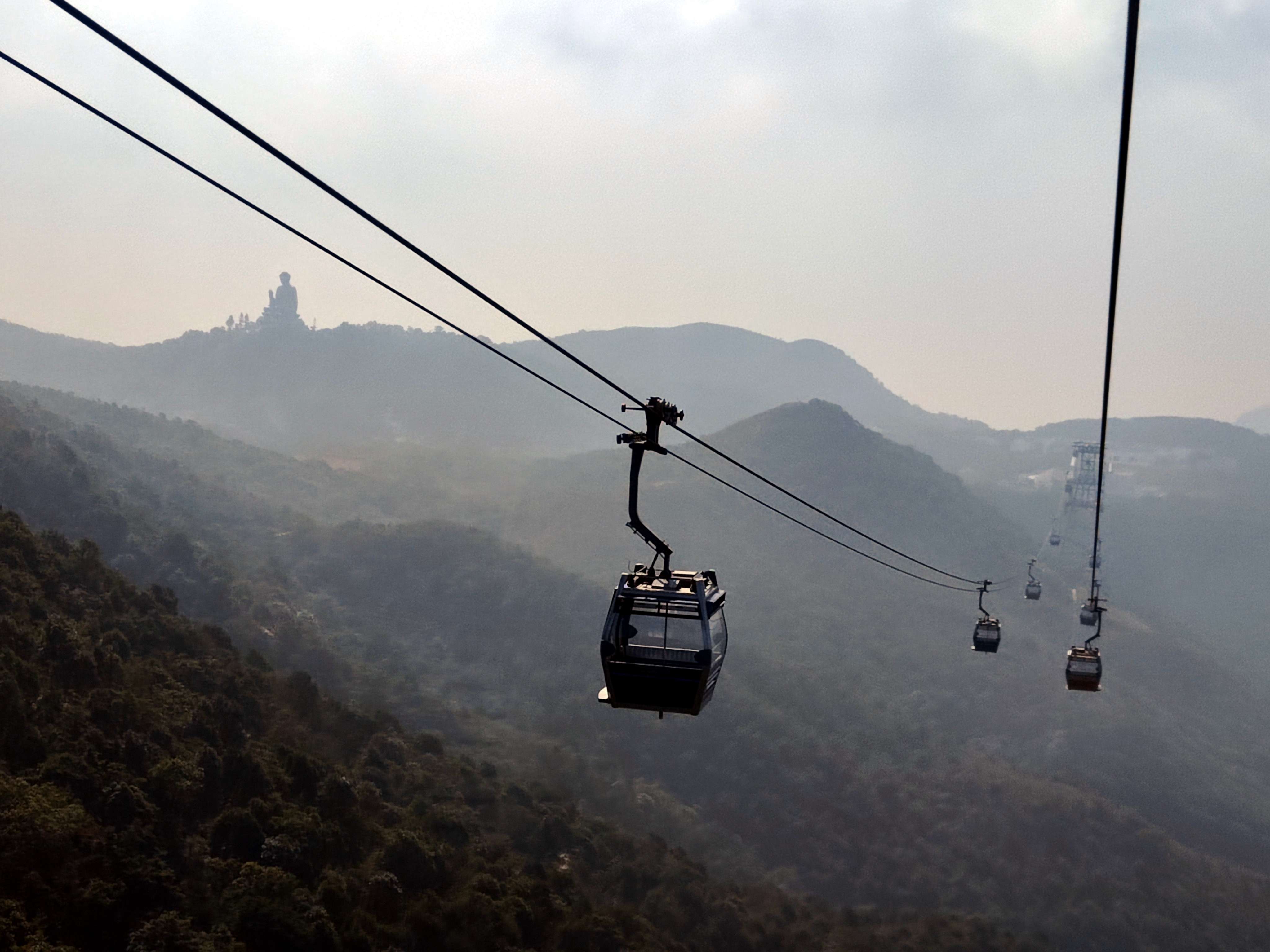 View from the Ngong Ping 360, a cable car in Lantau Island in Hong Kong. It connects Tung Chung, on the north coast of Lantau with the Ngong Ping area that is home of the Po Lin Monastery and the Tian Tan Buddha