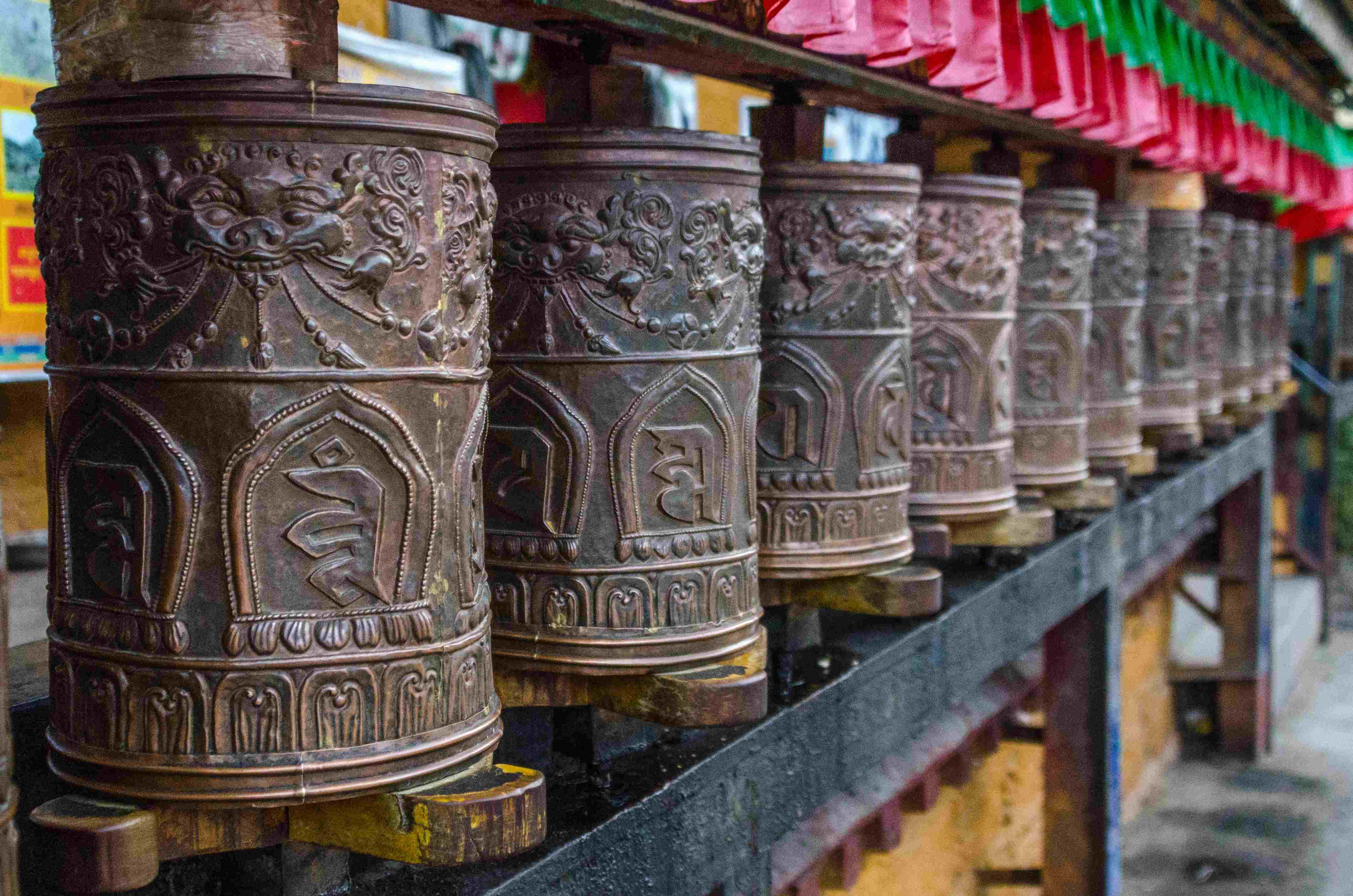 Prayer wheels at the entrance of Potala Palace