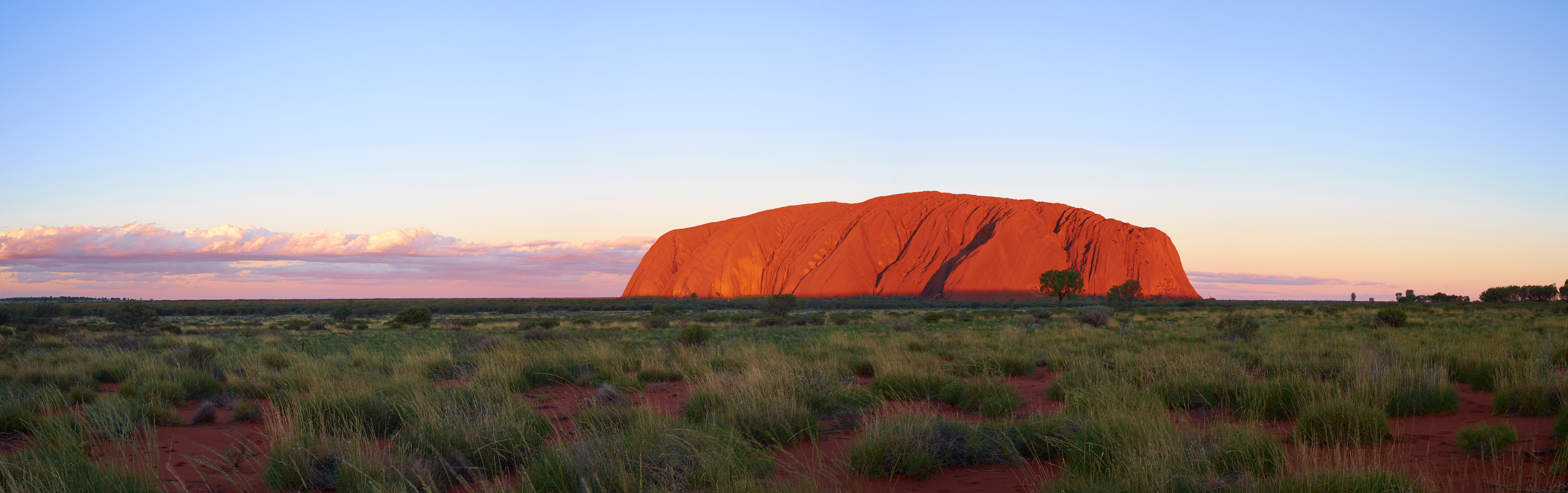 Evening descends on the Uluru-Kata Tjuta National Park, in the heart of the Australian Outback