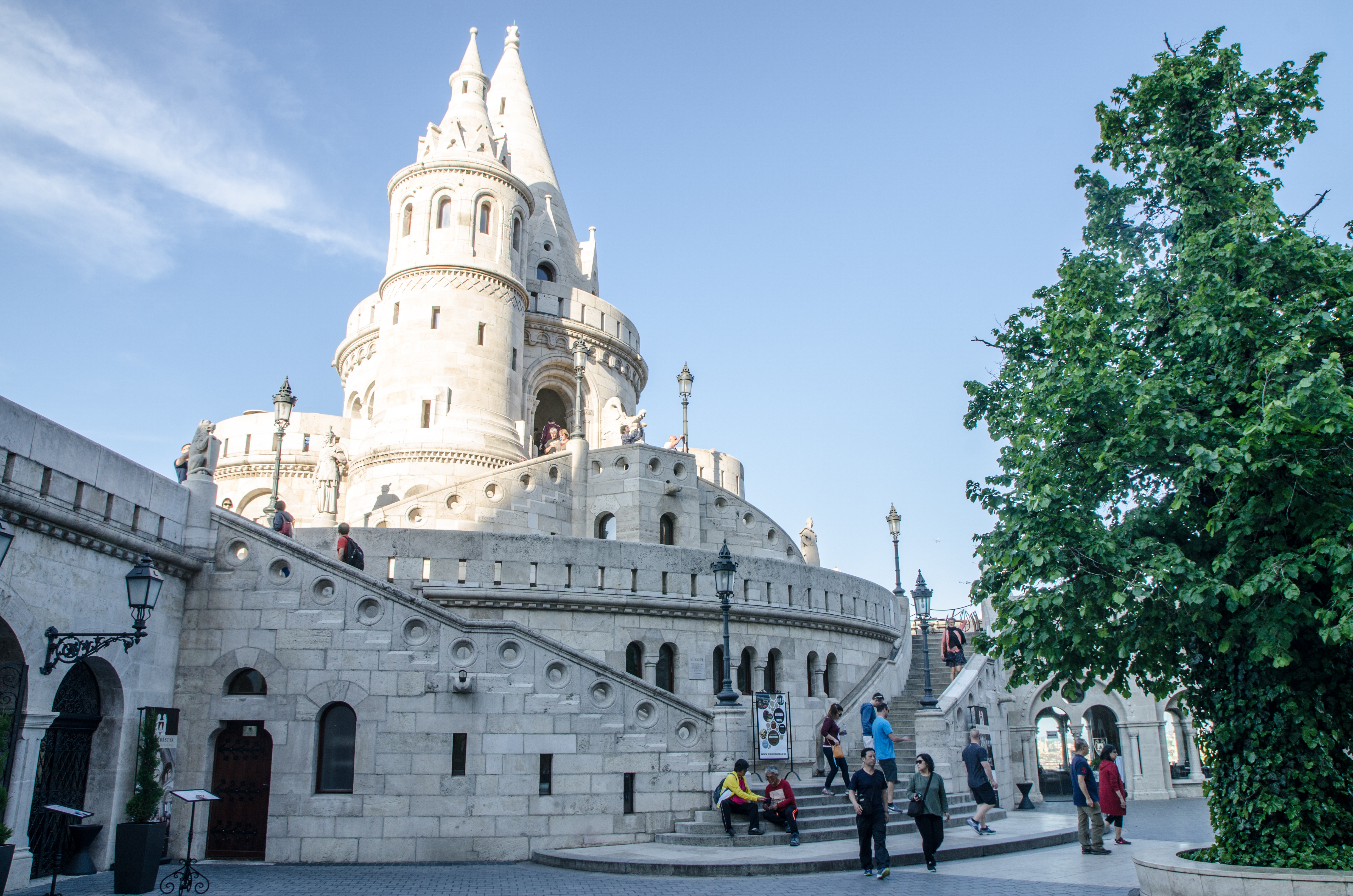 Tower of Fishermen's Bastion in Budapest during summer day with incidental people