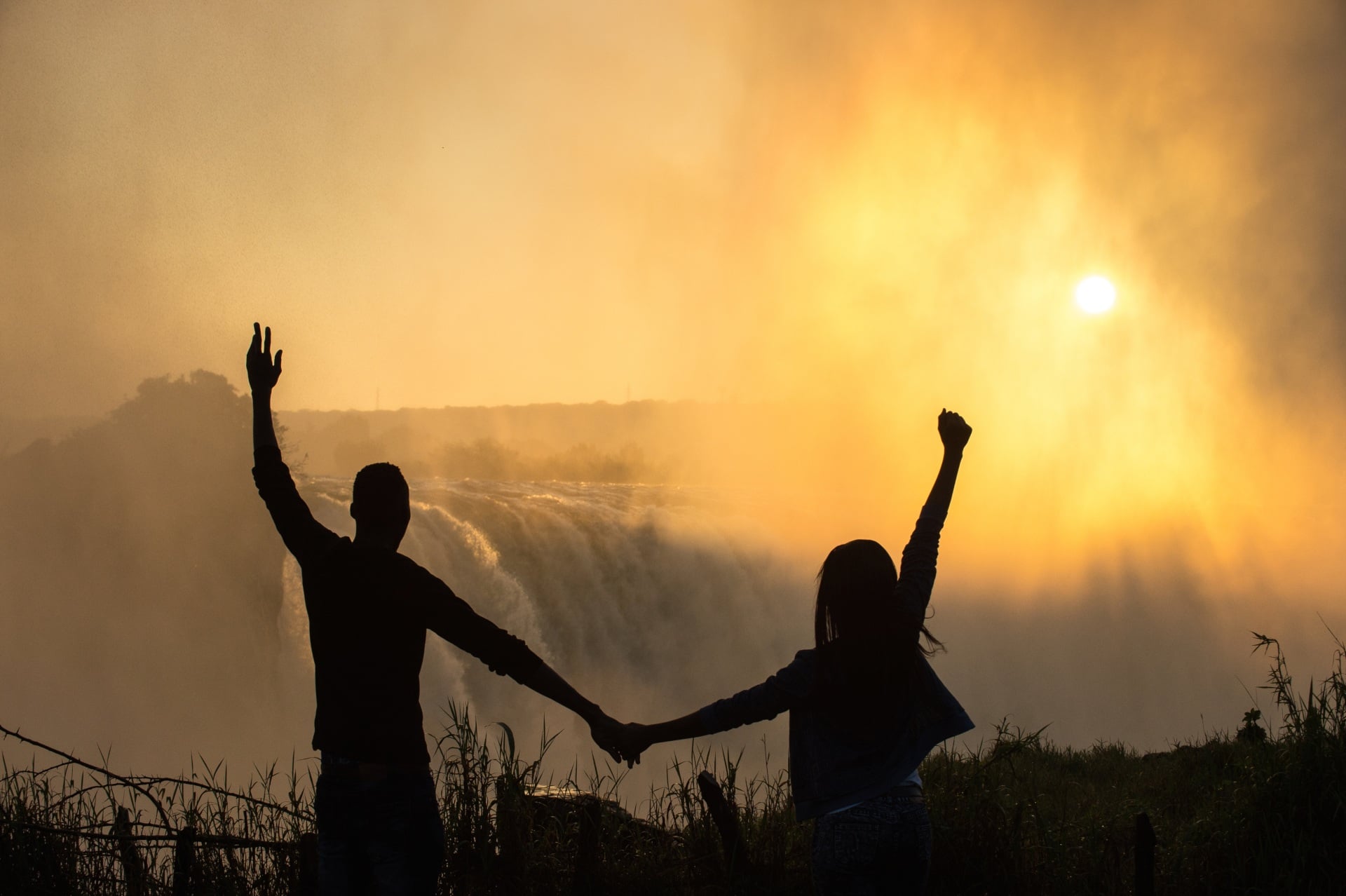 silhouette of couple at Victoria Falls