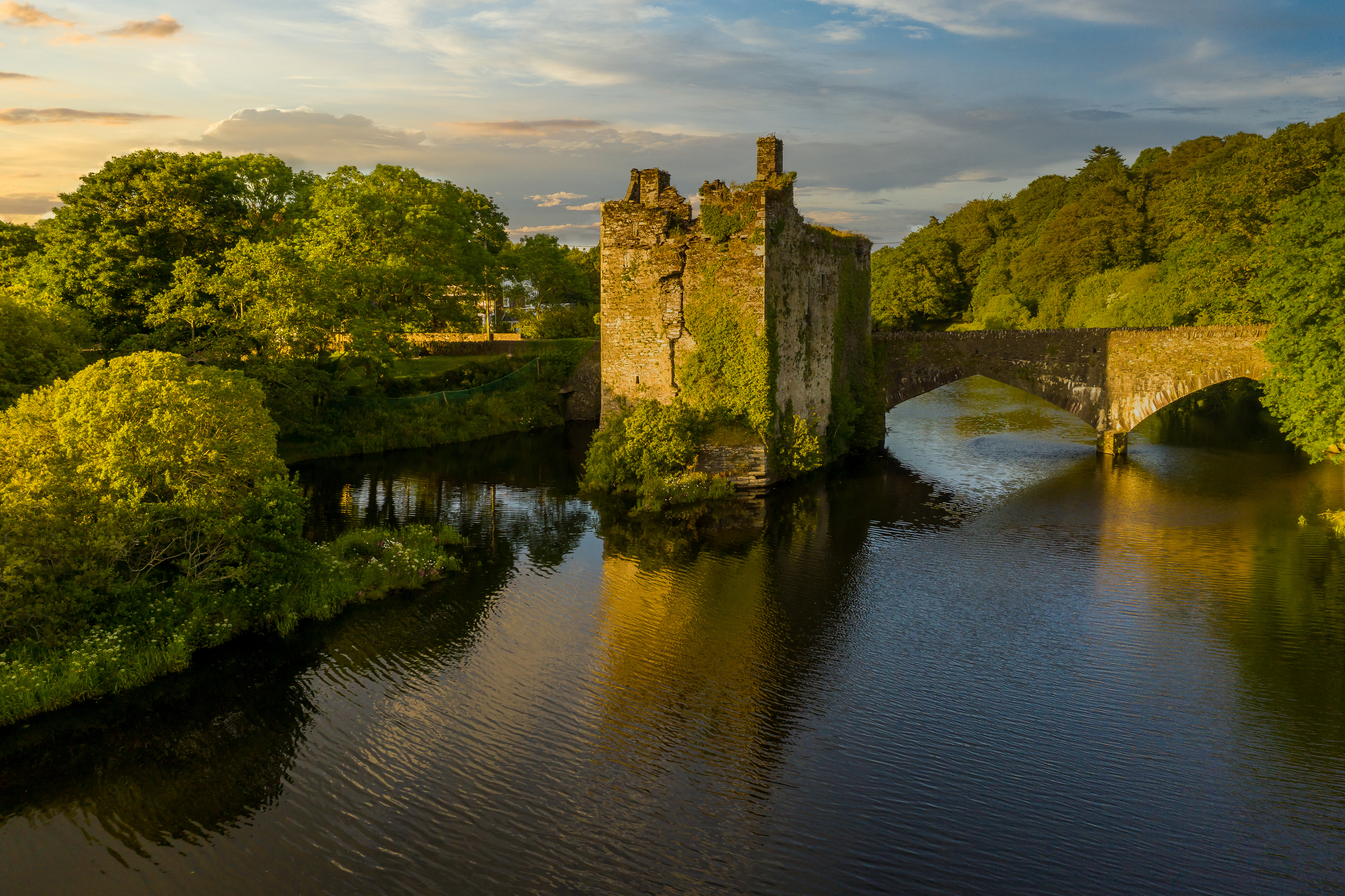 Carrigadrohid Cork Ireland old Irish touristic landmark meadow river sunset amazing aerial scenery view