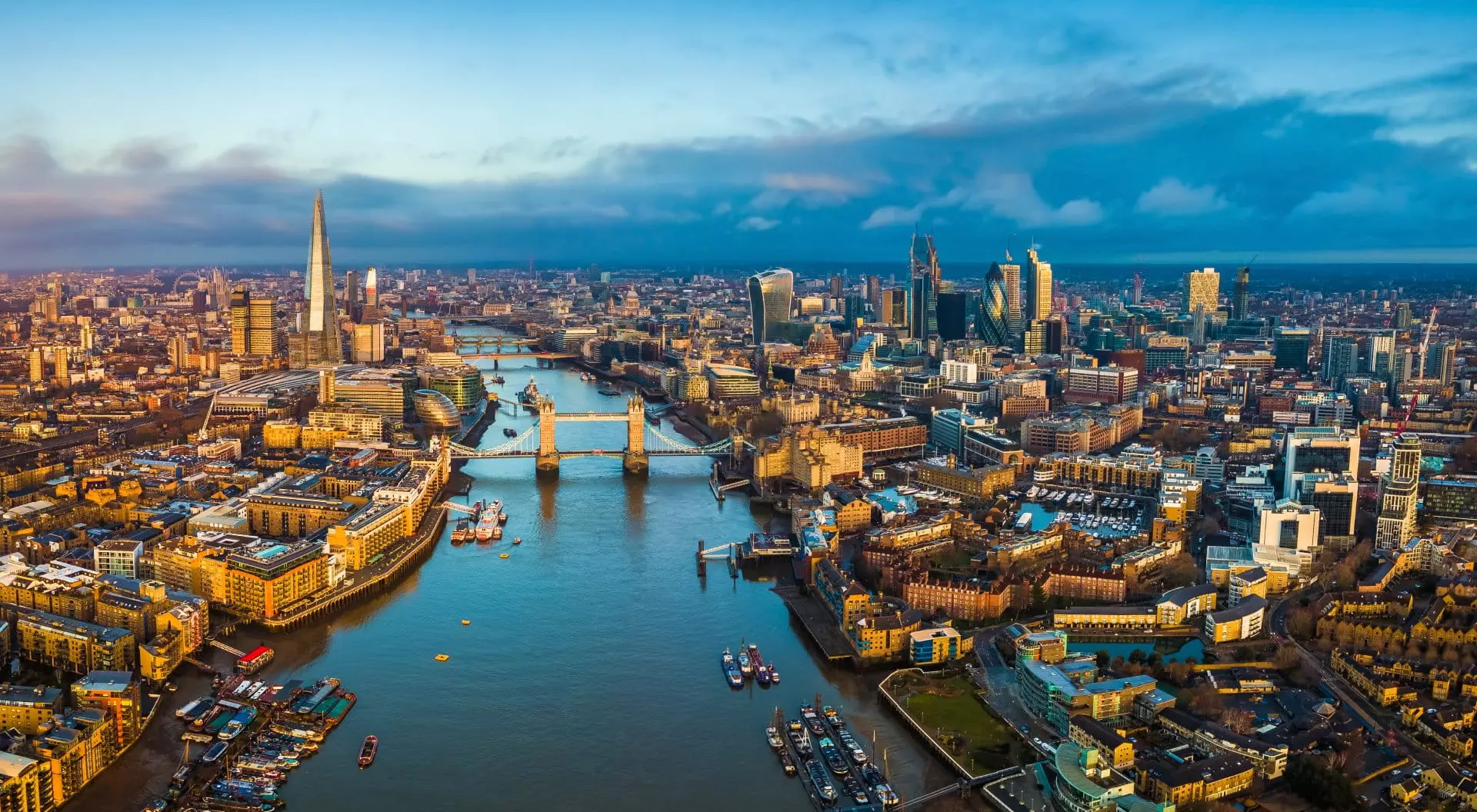 Aerial skyline view of London along the Thames at sunset, England UK United Kingdom