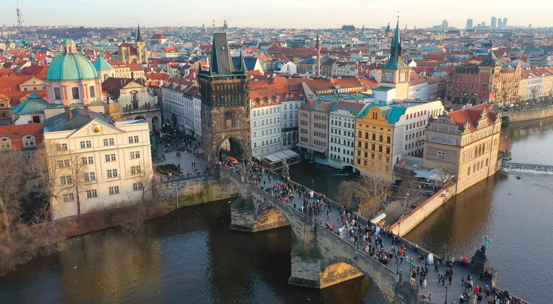 Aerial view of Charles Bridge at sunset light in desember in Prague, Czech Republic