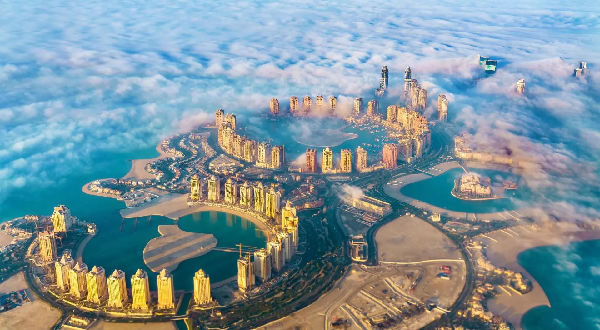 Qatar Aerial view of the Pearl-Qatar island in Doha through the morning fog - Qatar, the Persian Gulf