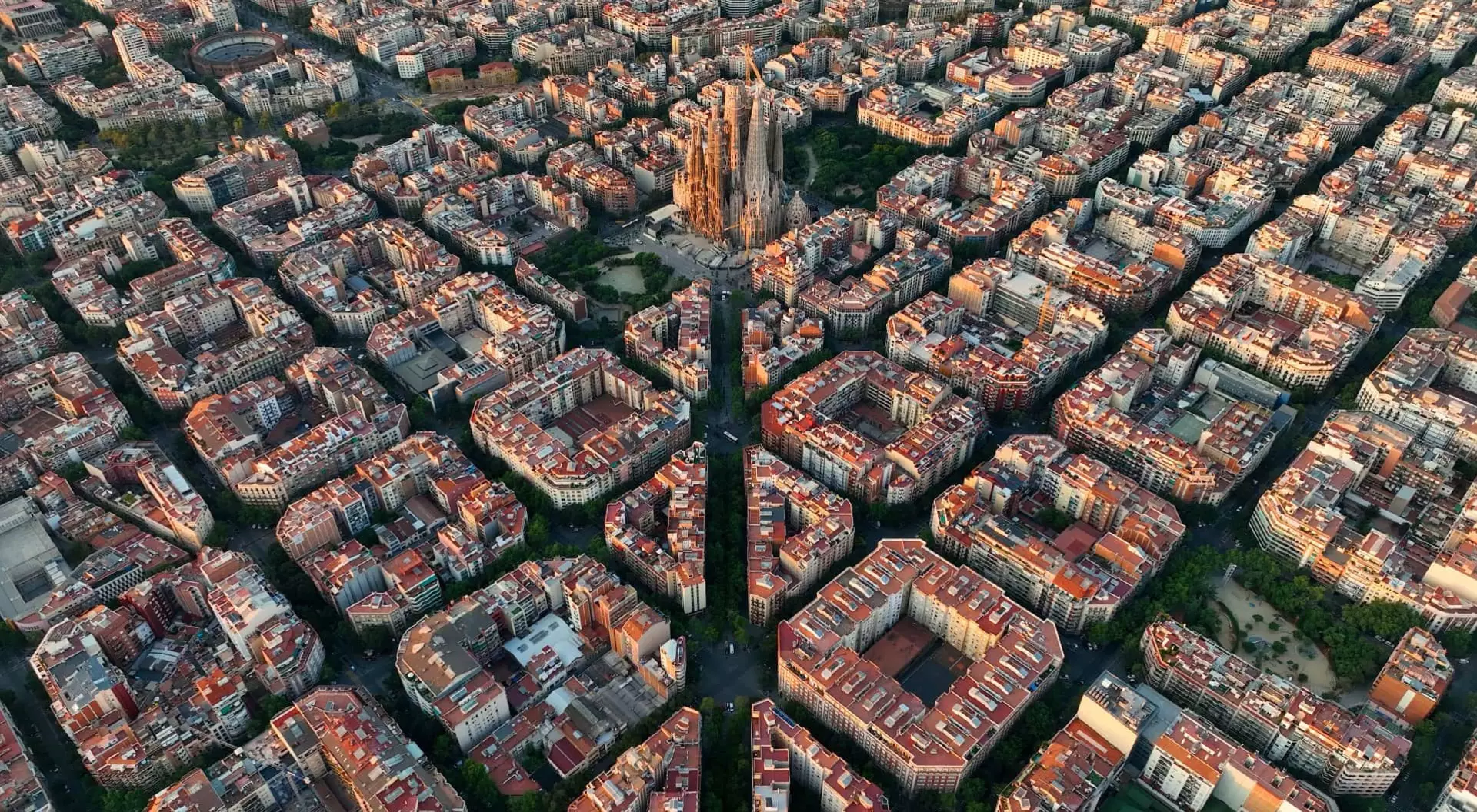 Aerial view of Barcelona city skyline and Sagrada Familia Cathedral at sunrise