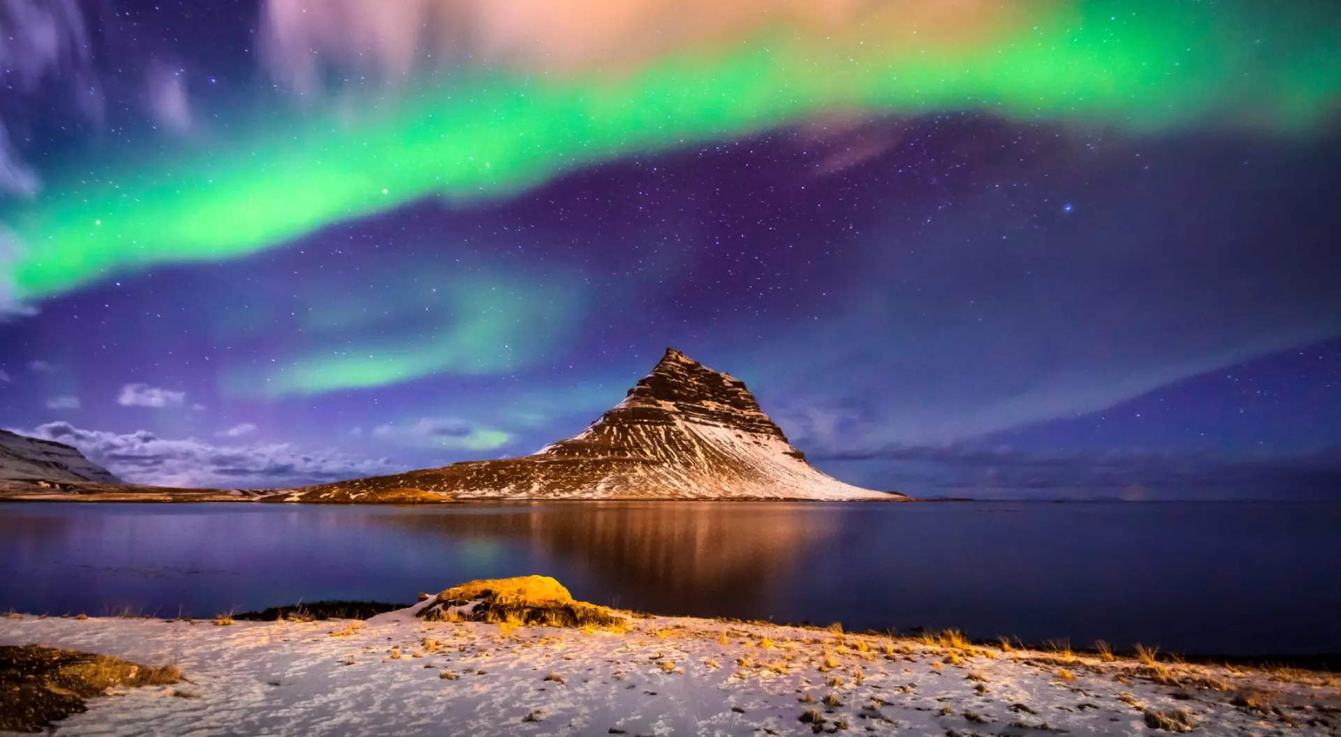Kirkjufell Mountain with the Northern Lights in winter, Iceland