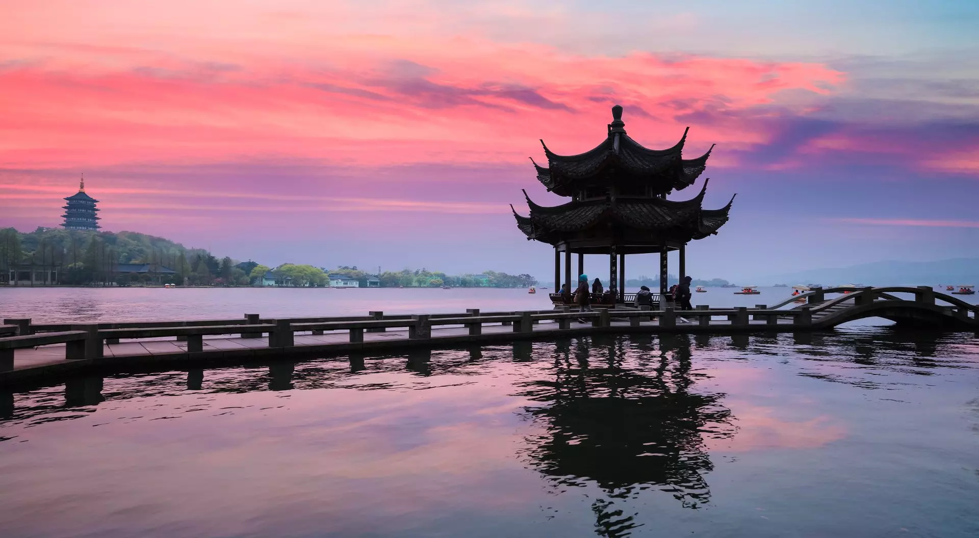 Ancient Pavilion Silhouette at Sunset on the West Lake in Hangzhou, China