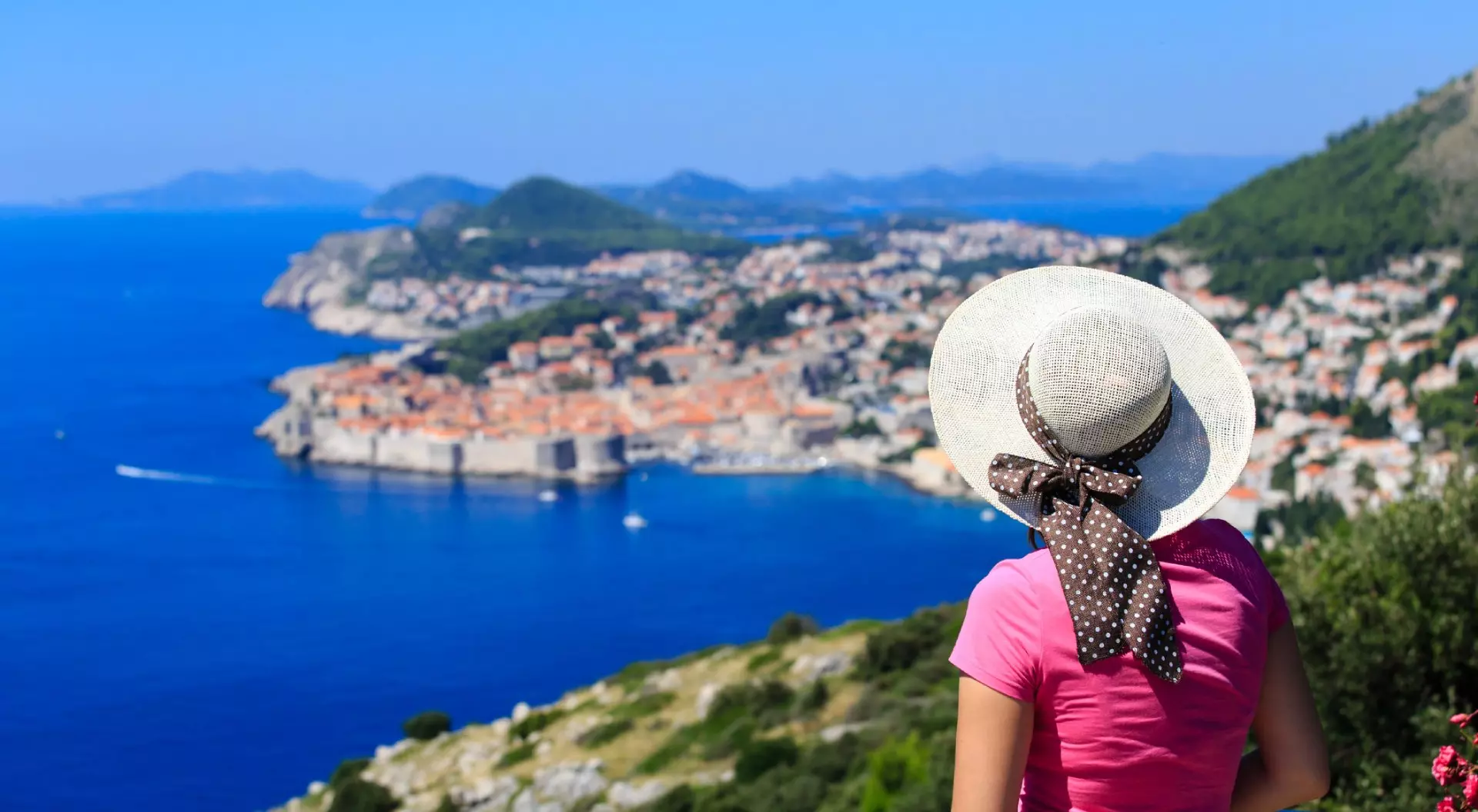 Back of Young Woman Looking Down at Dubrovnik Croatia