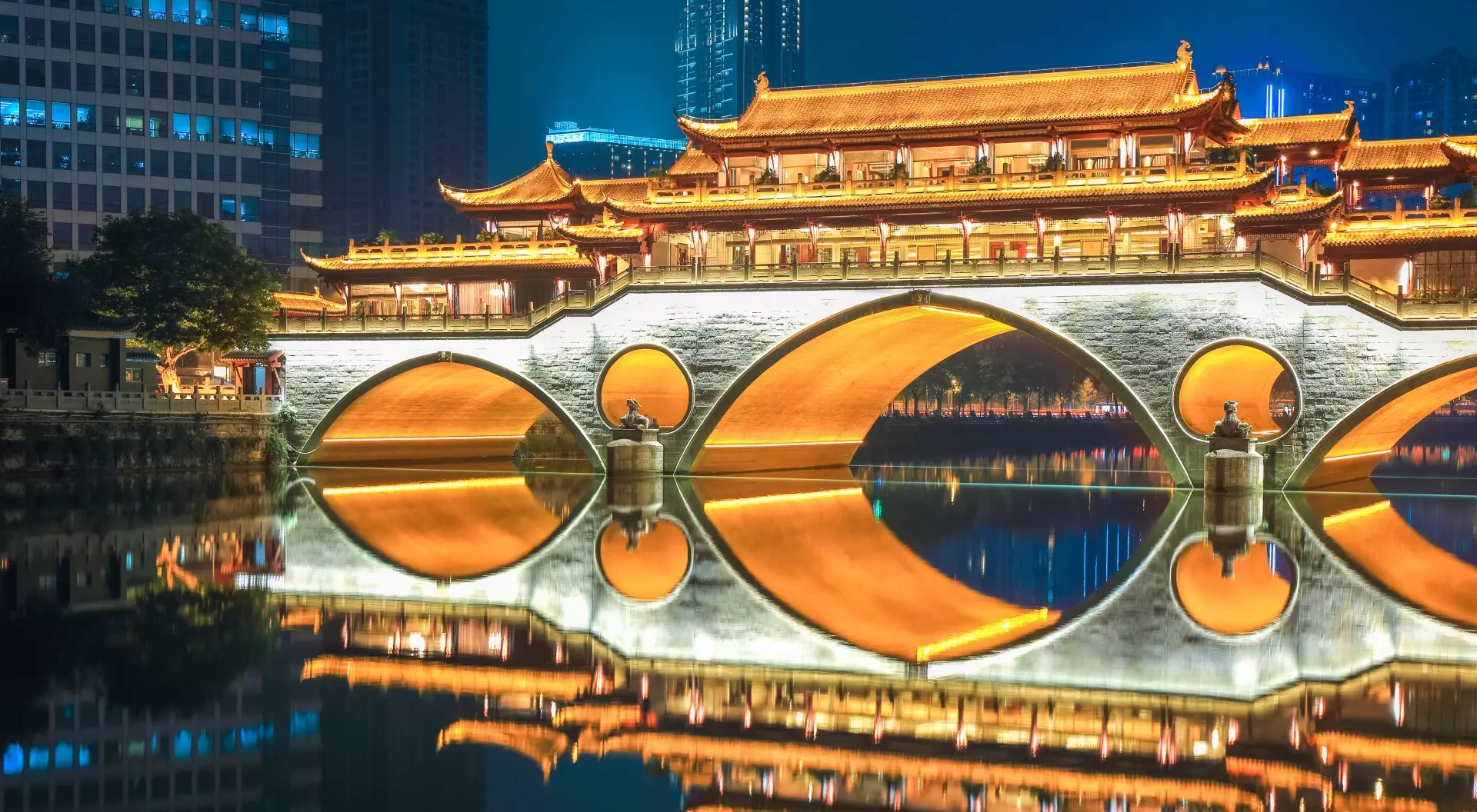 Chengdu old bridge at night ablaze with lights, Sichuan, China