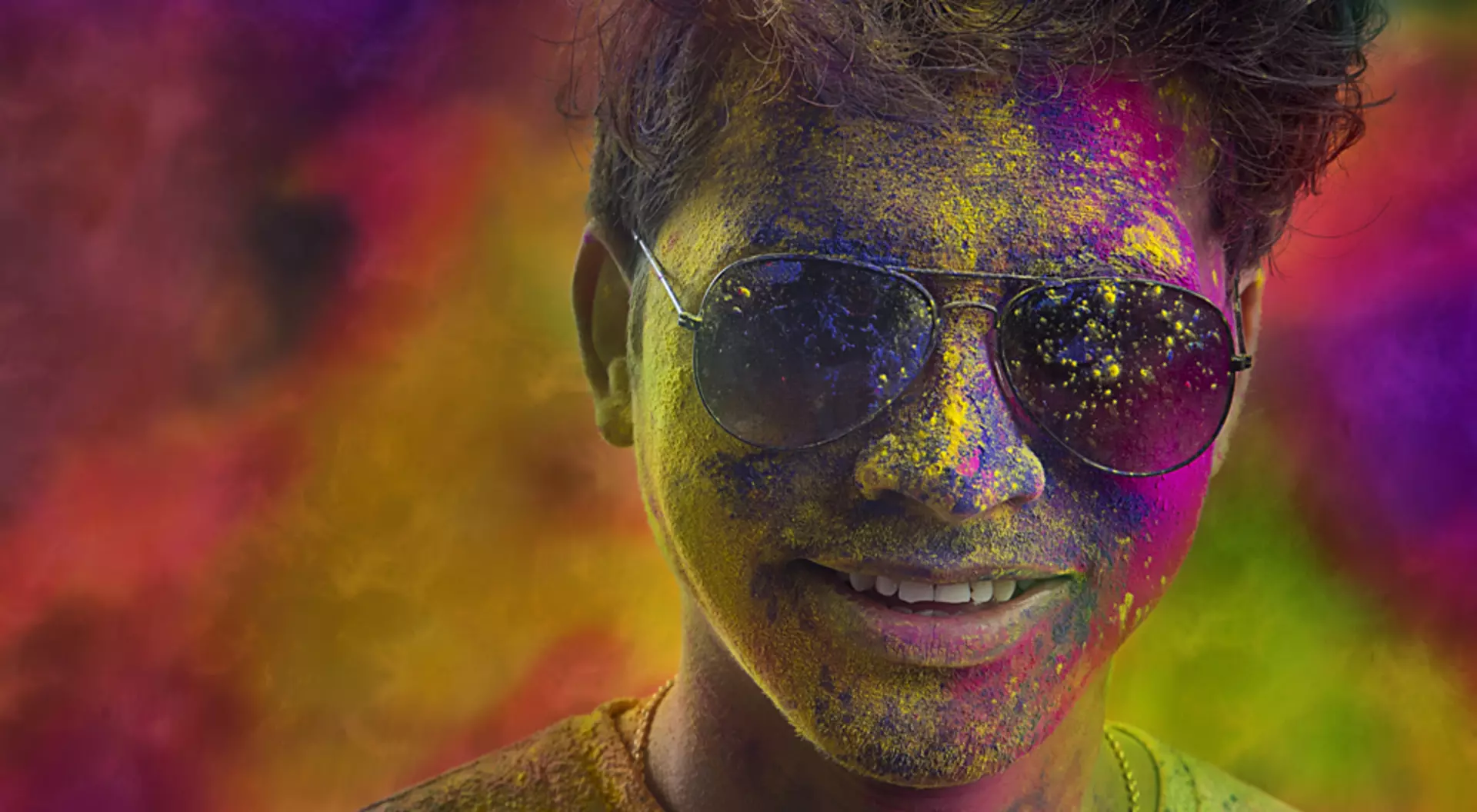 Close Up of Colourful Man Celebrating Holi, India