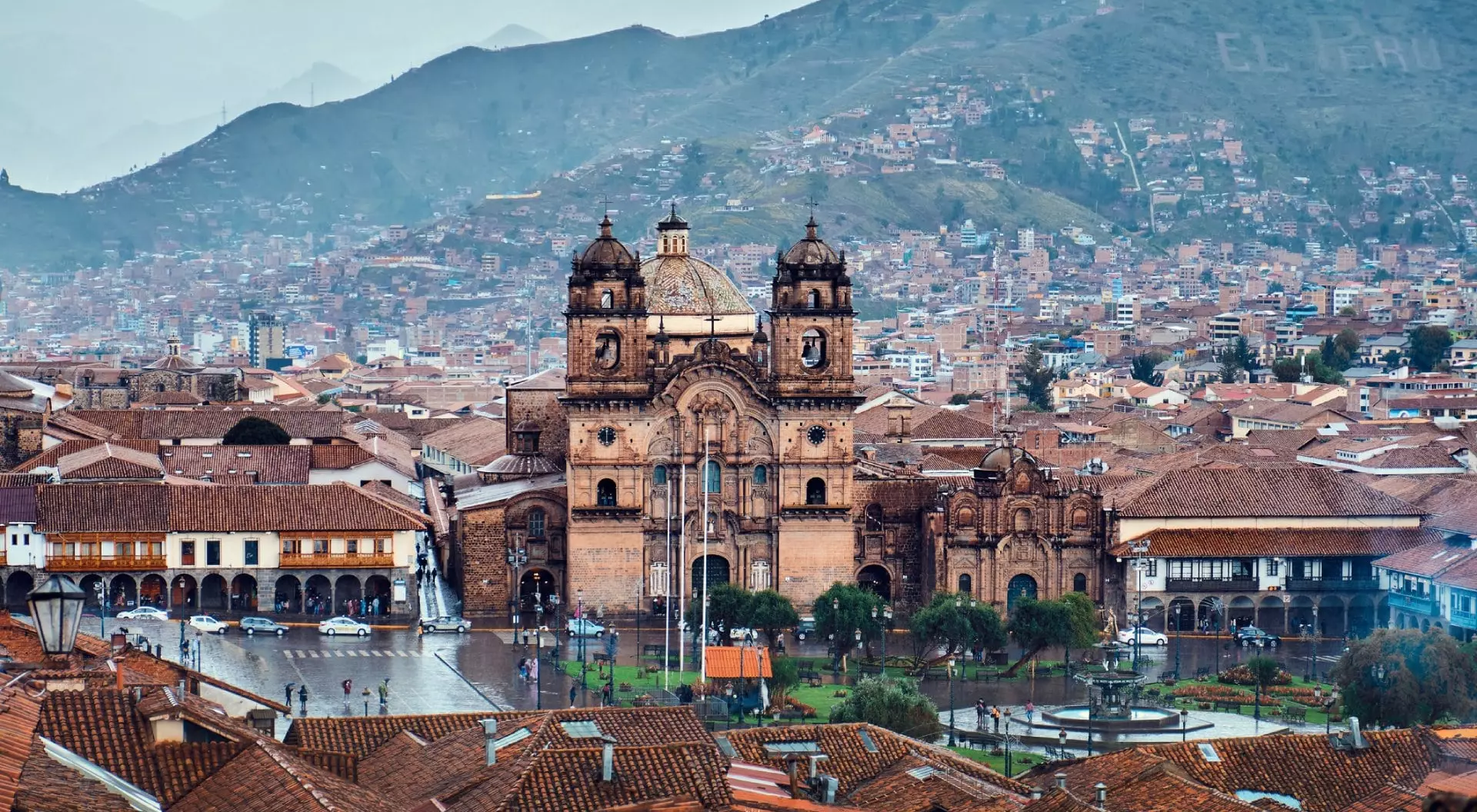 Cusco, Peru. Cityscape view of the central square, the old town and the Andes.