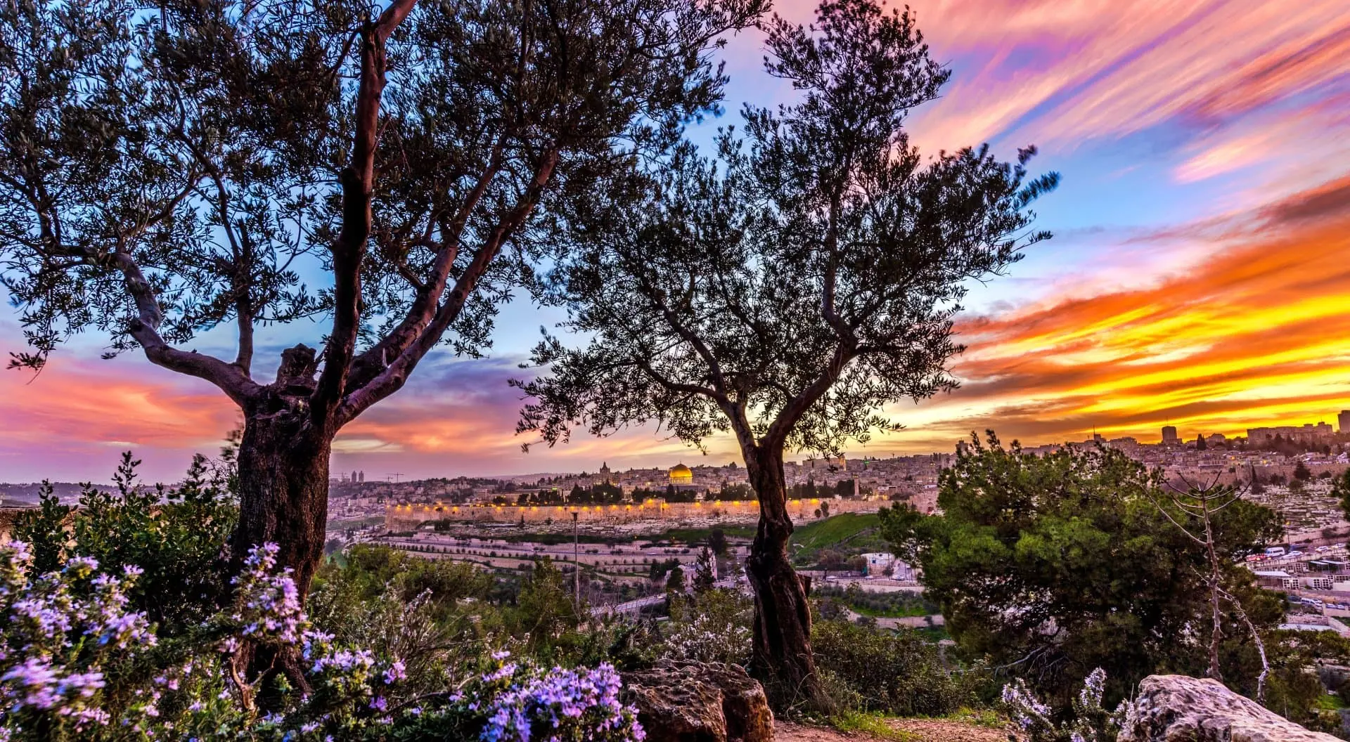Dramatic sunset over Jerusalem seen from Mount of Olives, Israel