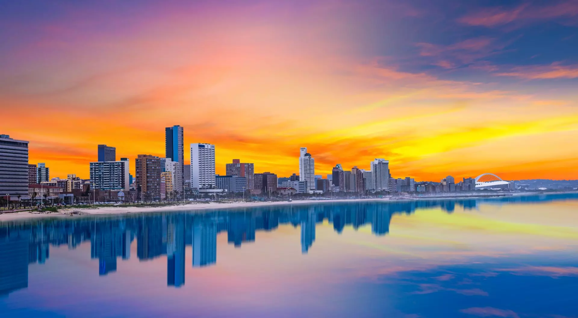 South Africa Durban city beachfront skyline during summer with twilight sky in Kwazulu-Natal South Africa