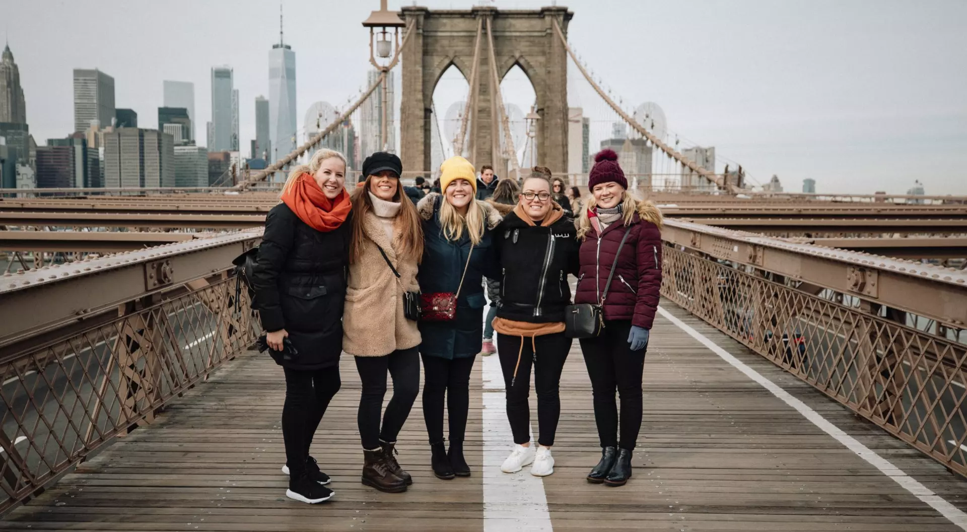 Group of tourist on Brooklyn Bridge