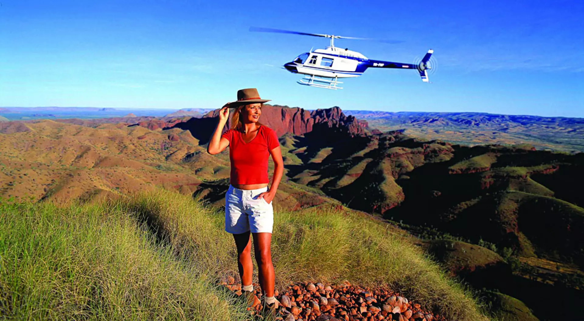 Hiking and Helicopter, with Ragged Range in the Background in the East Kimberley, Credit Tourism Western Australia