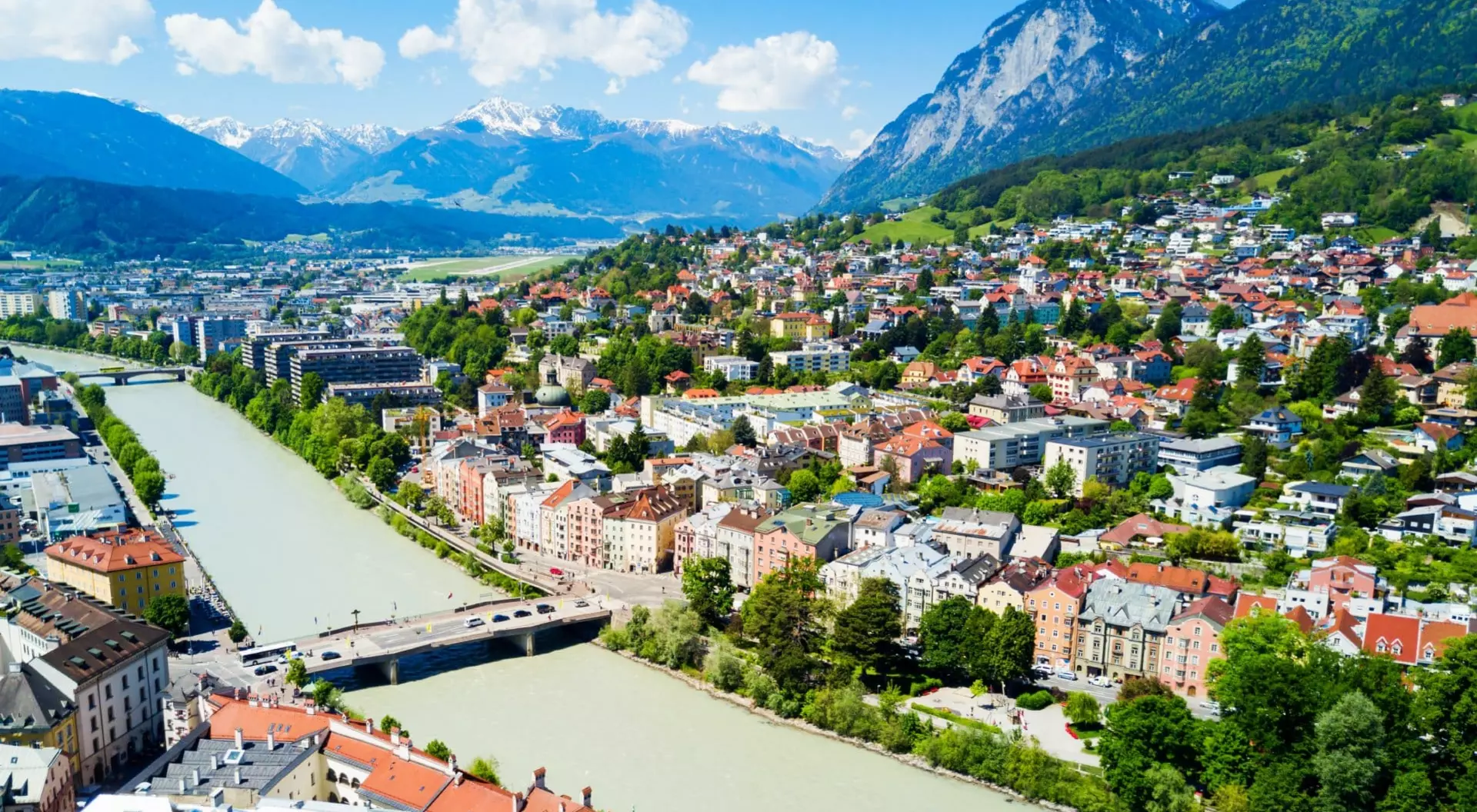 Innsbruck, Austria Inns river and Innsbruck city center aerial panoramic view. Innsbruck is the capital city of Tyrol in western Austria