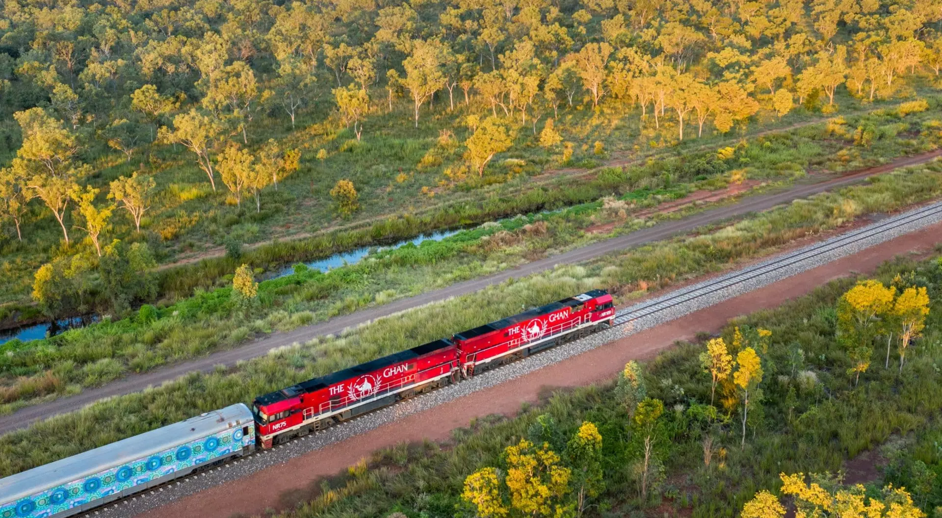 The Ghan in Northern Territory, Australia (©Journey Beyond) An aerial image of The Ghan train cuts through the Northern Territory of Australia