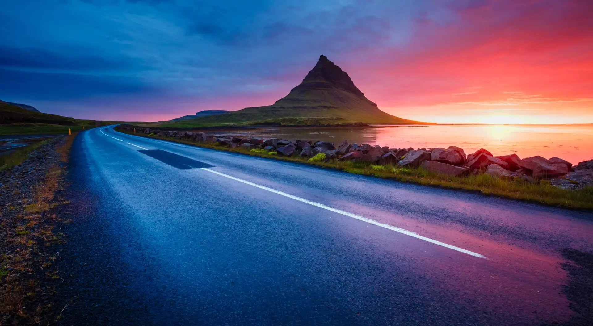 Kirkjufell, Snaefellsnes, Iceland Kirkjufell volcano in the evening from the coast of Snaefellsnes Peninsula, Kirkjufellsfoss, Iceland
