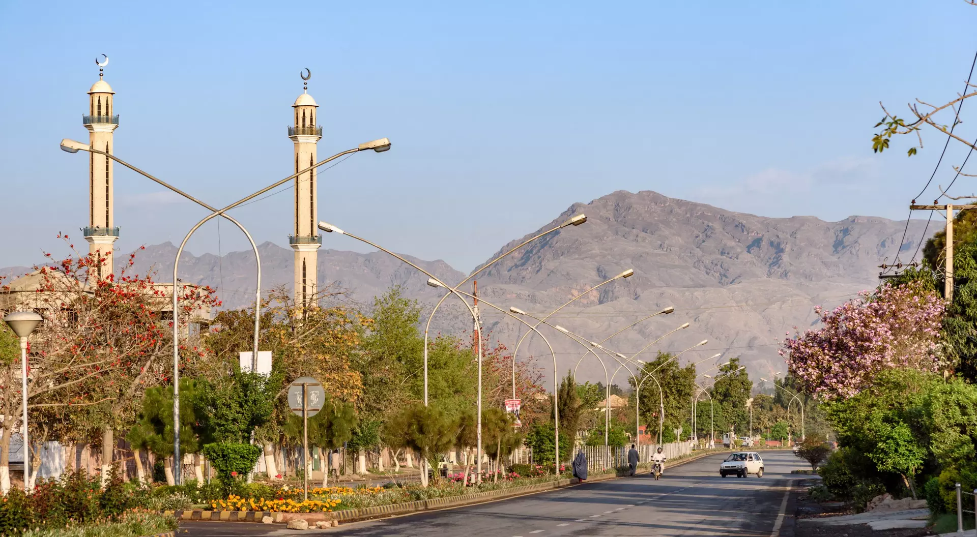 views of a road with mountain in background