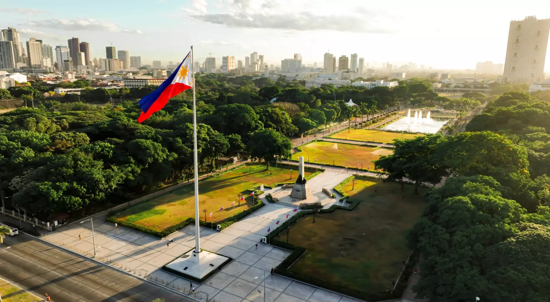 Luneta Park, Manila Overhead view of the Philippines flag waving over Luneta Park during a sunny day in Manila, Philippines