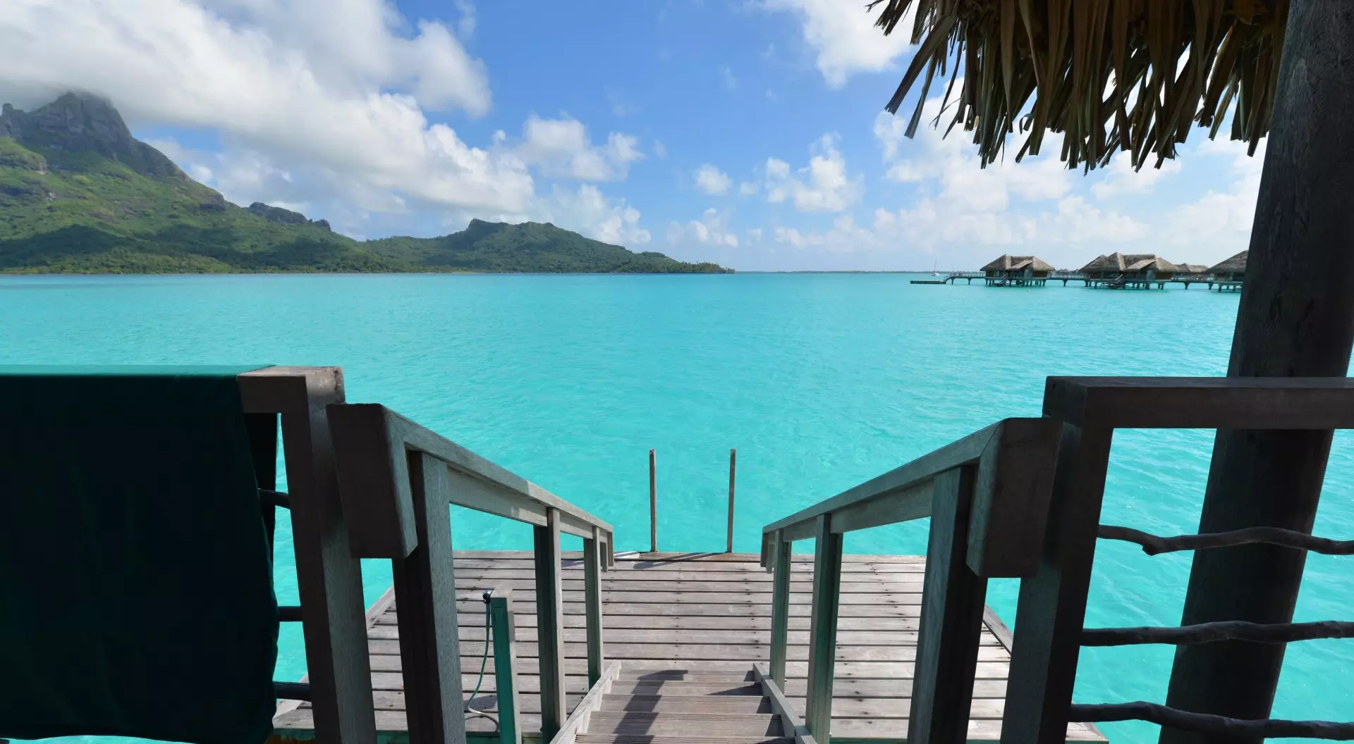 Overwater Bungalow view of Bora Bora's world class crystal clear lagoon in French Polynesia, South Pacific.