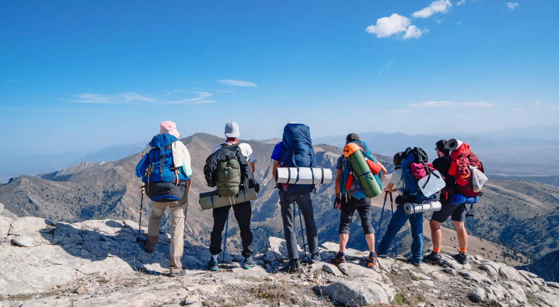 People Watching the beautiful scenery of mountain peaks.