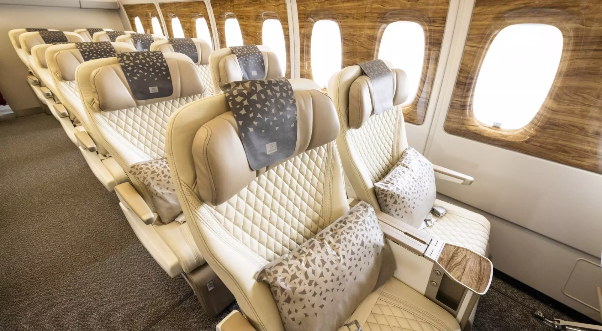 Premium Economy class onboard of Emirates Airlines Airbus A380. Comfortable travel style.