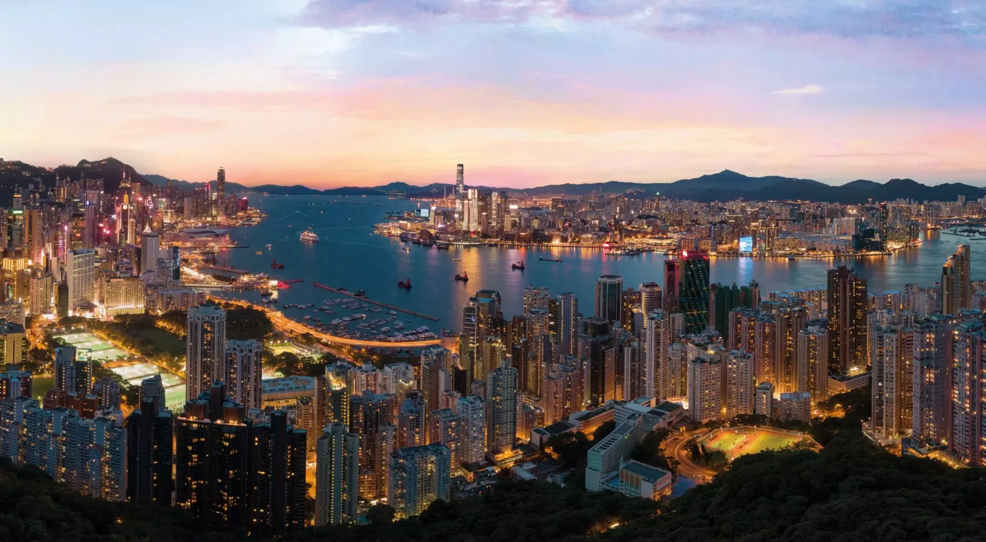The skyline of Hong Kong creates an unforgettable panoramic view of the harbour and skyscrapers.