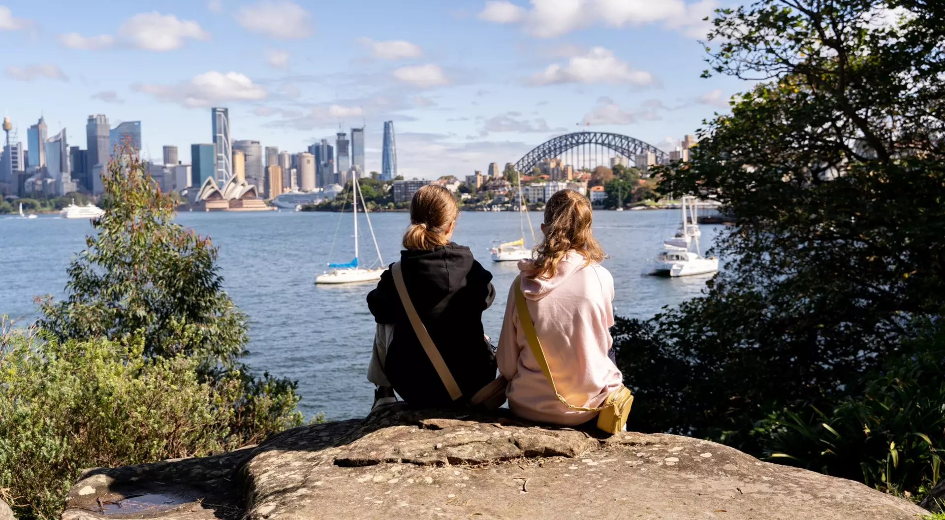 Sydney, Australia Two young girls looking at Sydney harbour.