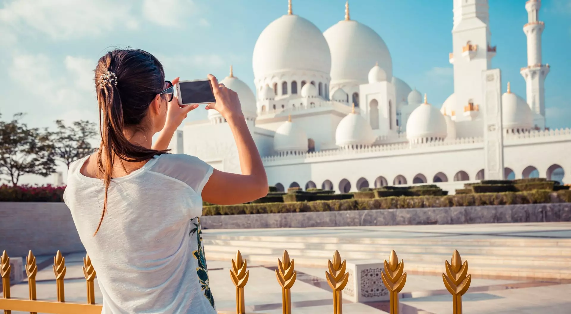 Woman Photographing Sheikh Zayed Grand Mosque, Abu Dhabi, United Arab Emirates (UAE)