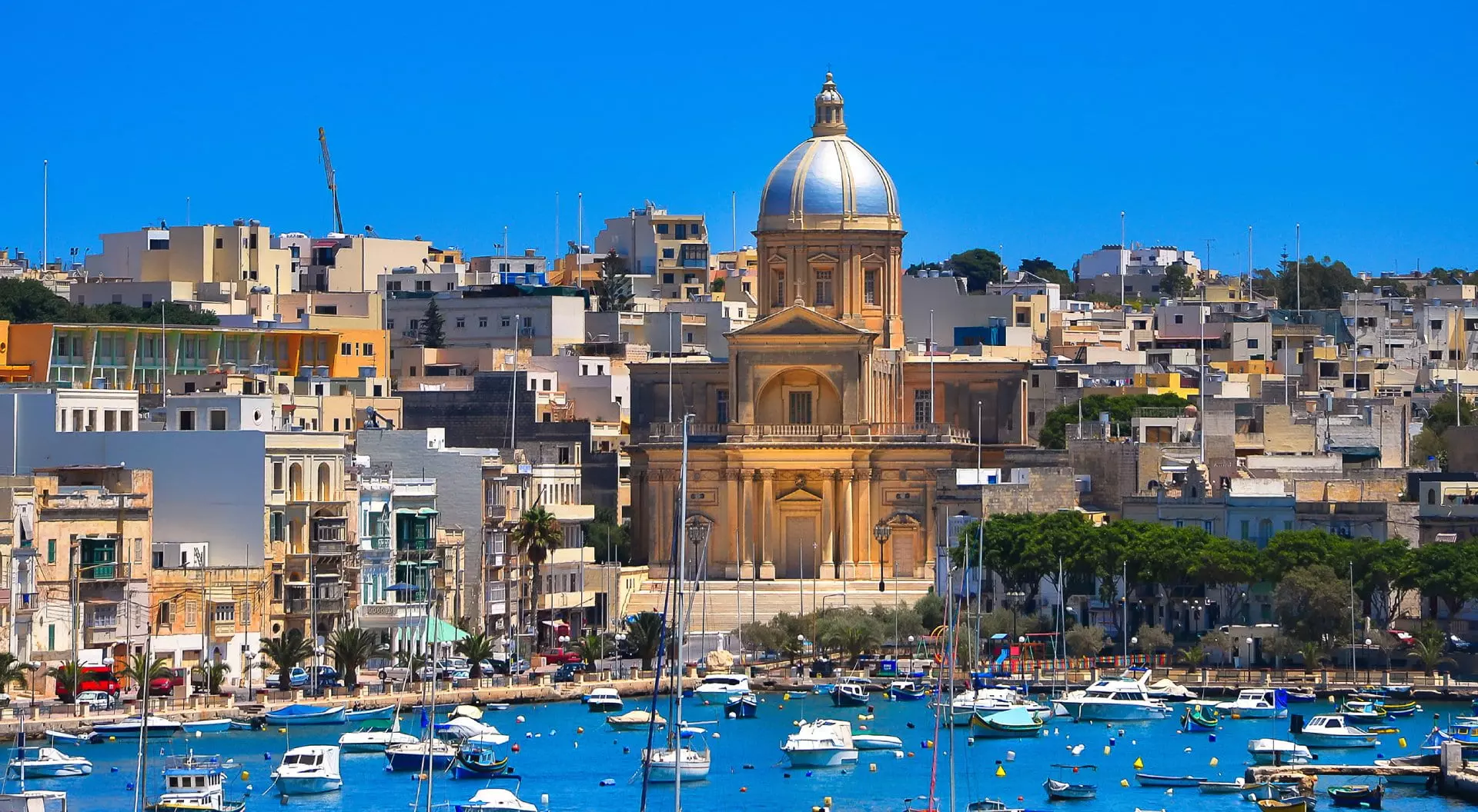 Yachts and boats in the bay near Valletta, Malta