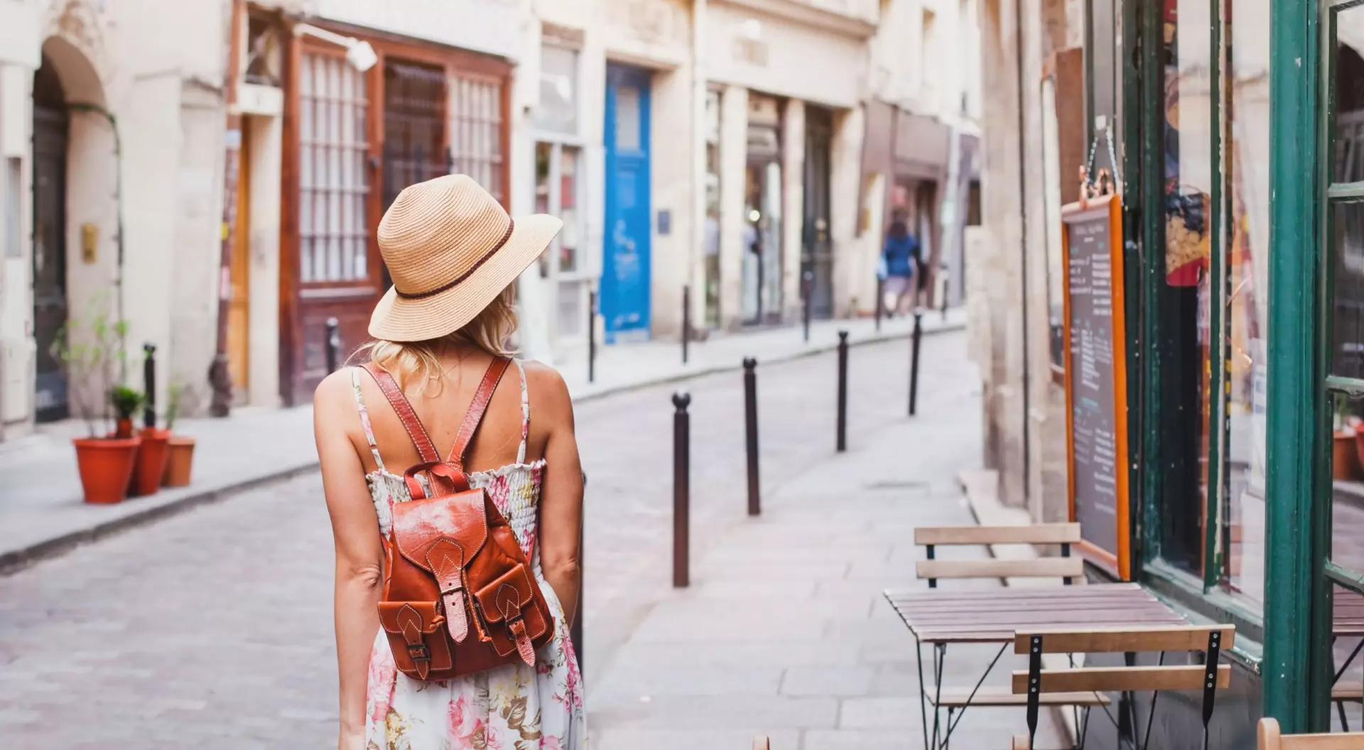 Europe Young woman tourist walking on a street in Europe