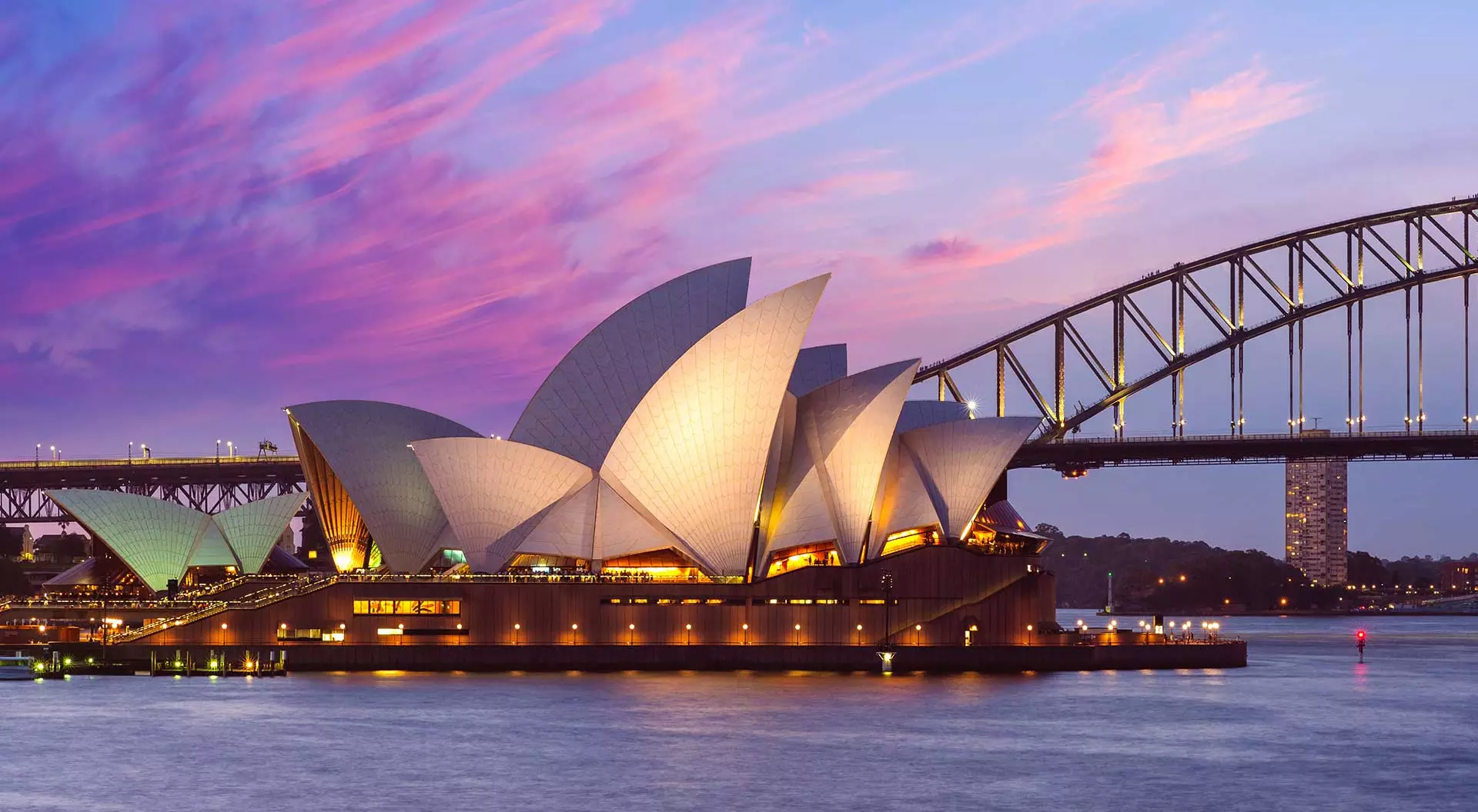 Sydney Opera House at dusk with Sydney Harbour Bridge