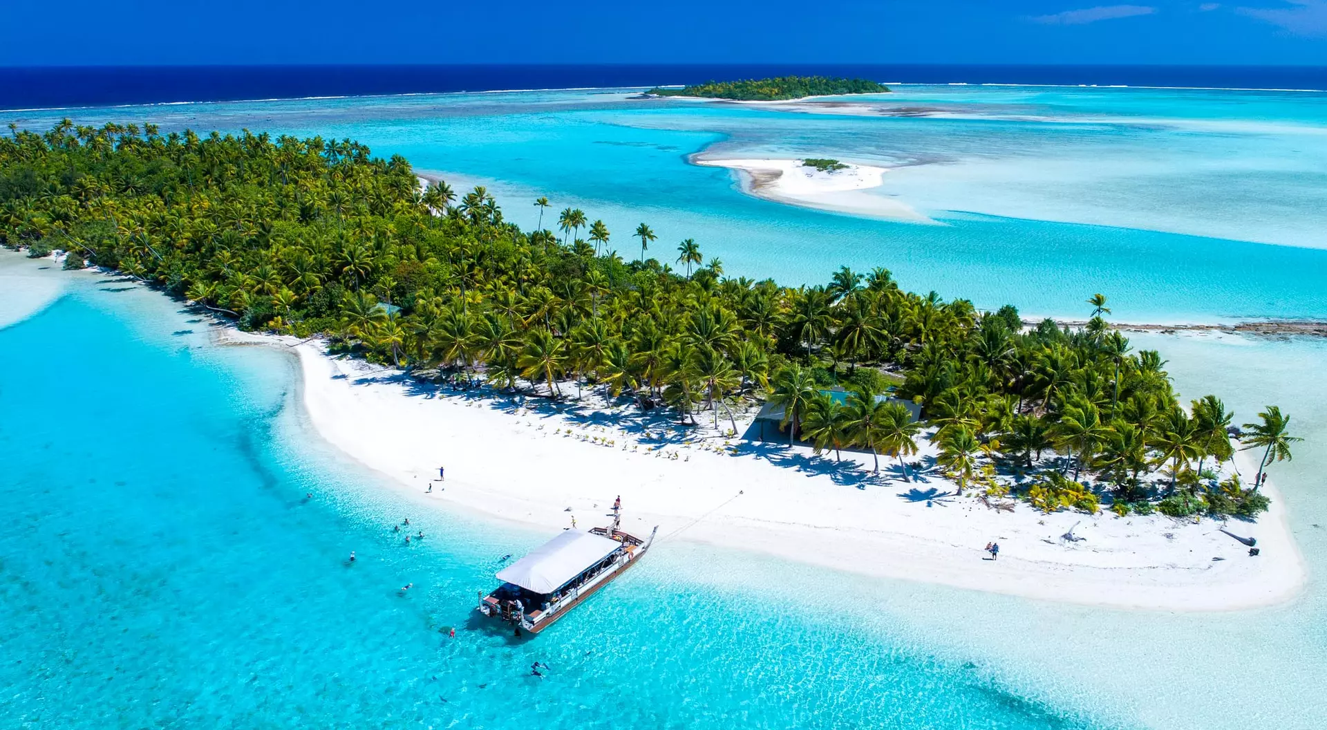 Aitutaki, Cook Islands aerial view of a white-sand beach and island
