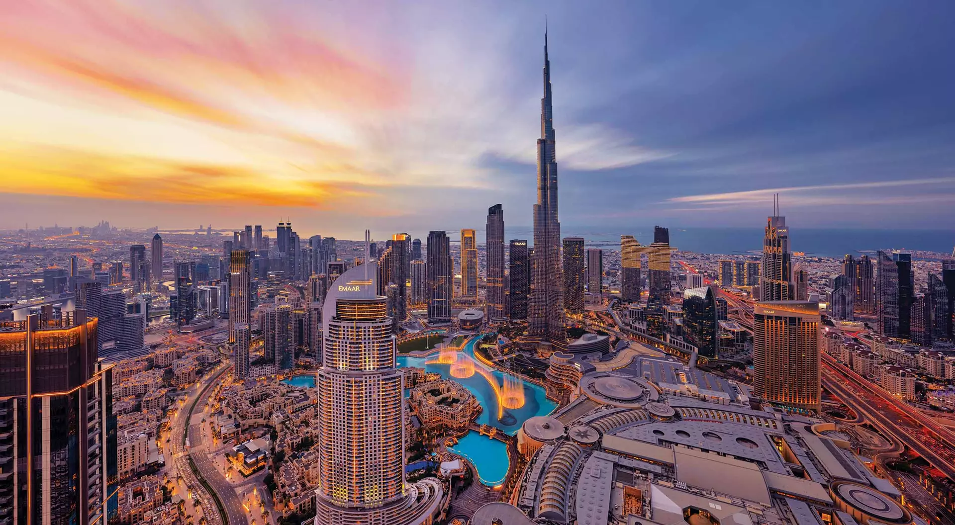 A panoramic view of the Burj Khalifa in Dubai as well as the rest of the skyline right at twilight.