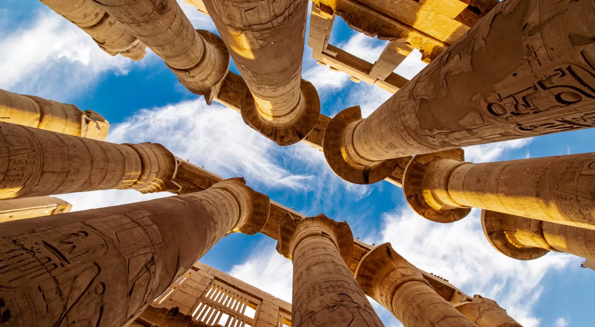 view of ancient temple pillars into the sky
