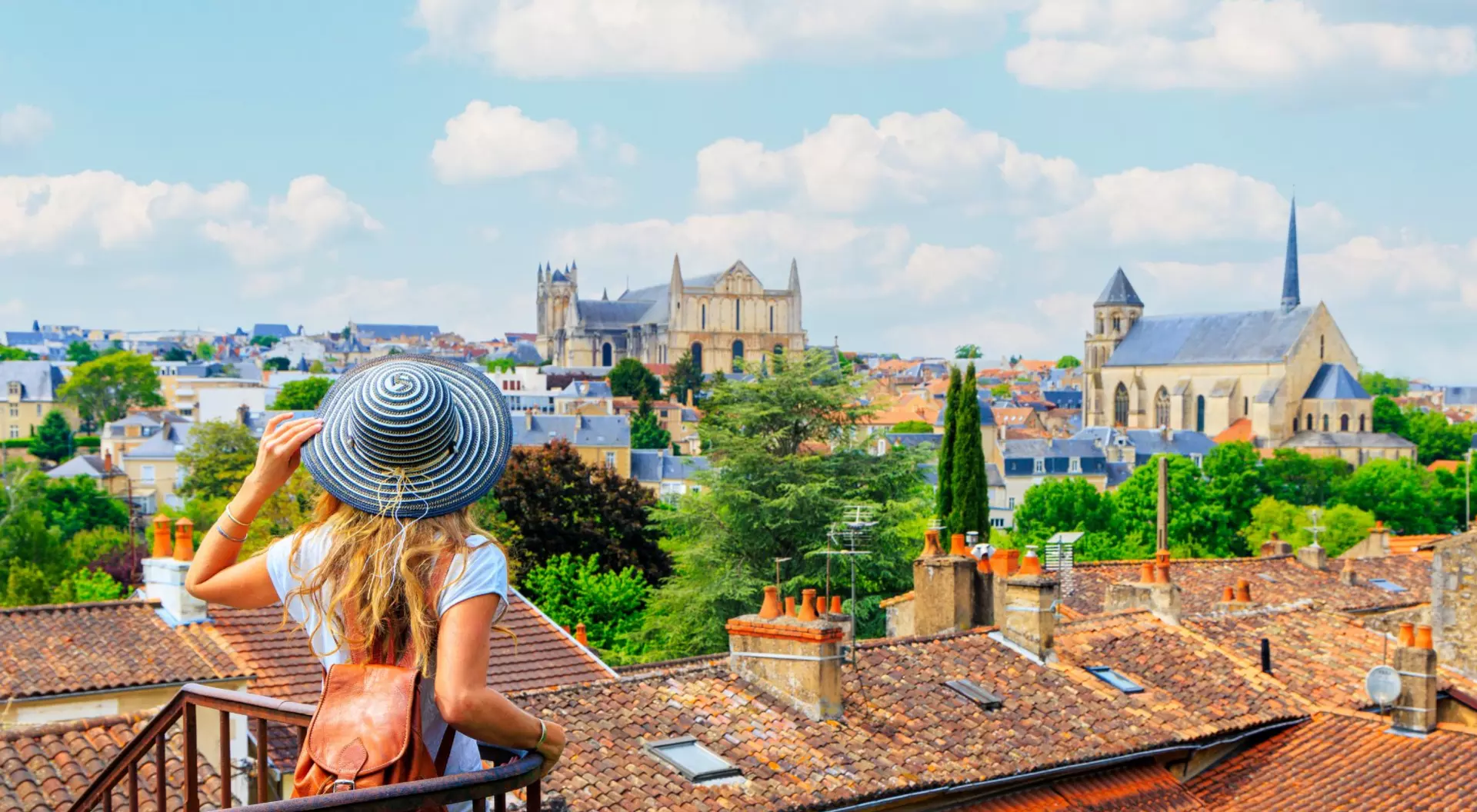 Poitiers, France Poitiers city landscape- Woman looking at urban skyline- France