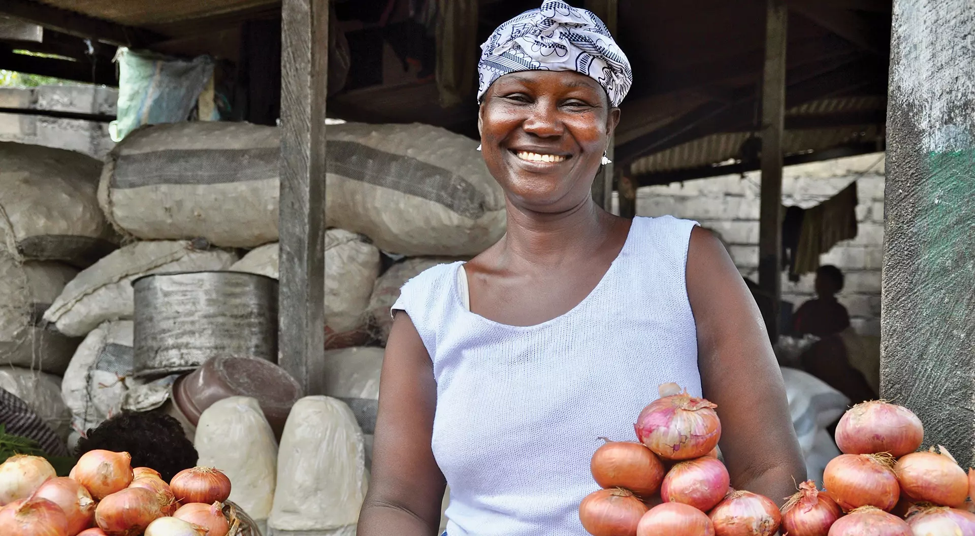 Ghana A smiling woman at a market in Ghana