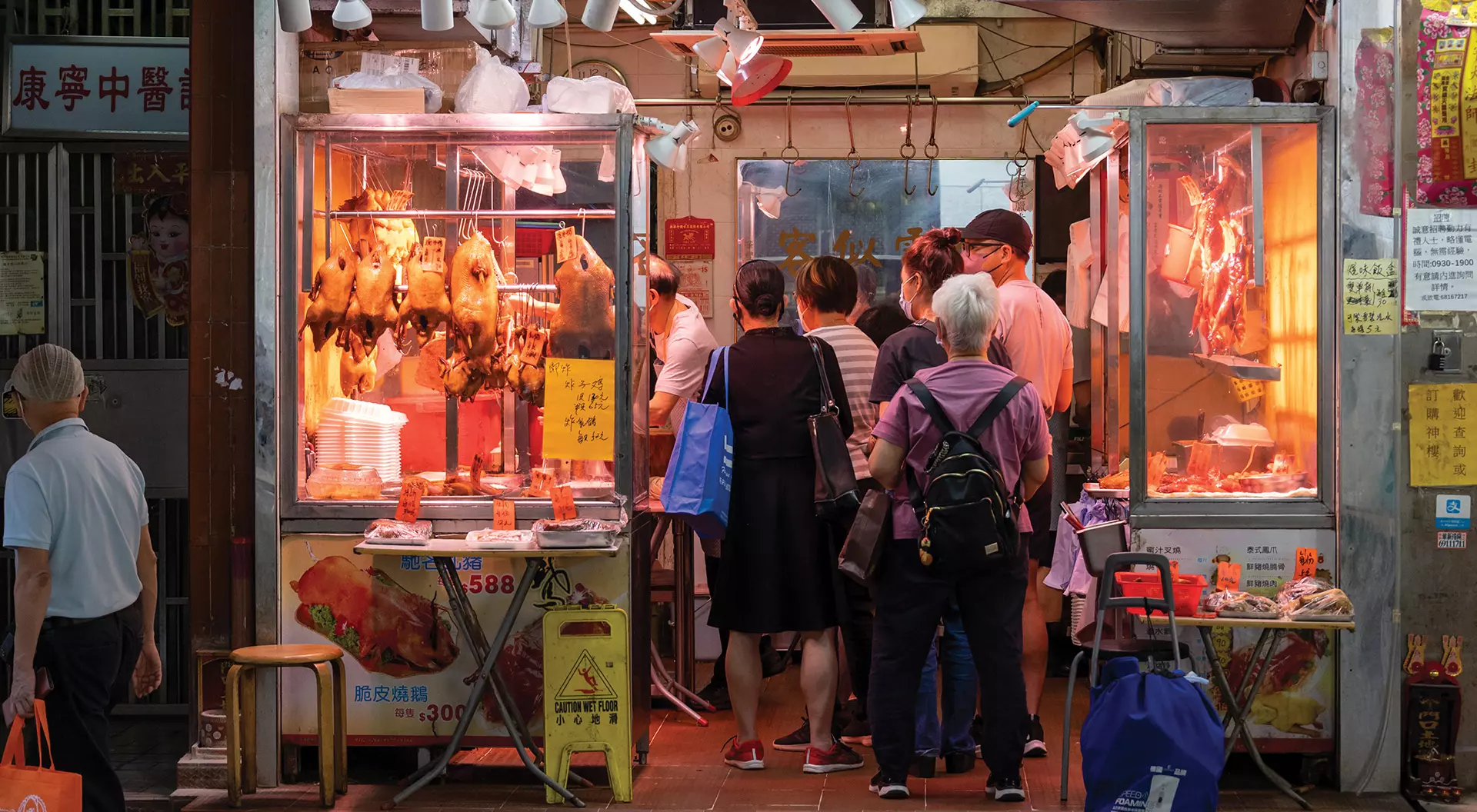 Patrons lining up inside a Hong Kong goose restaurant