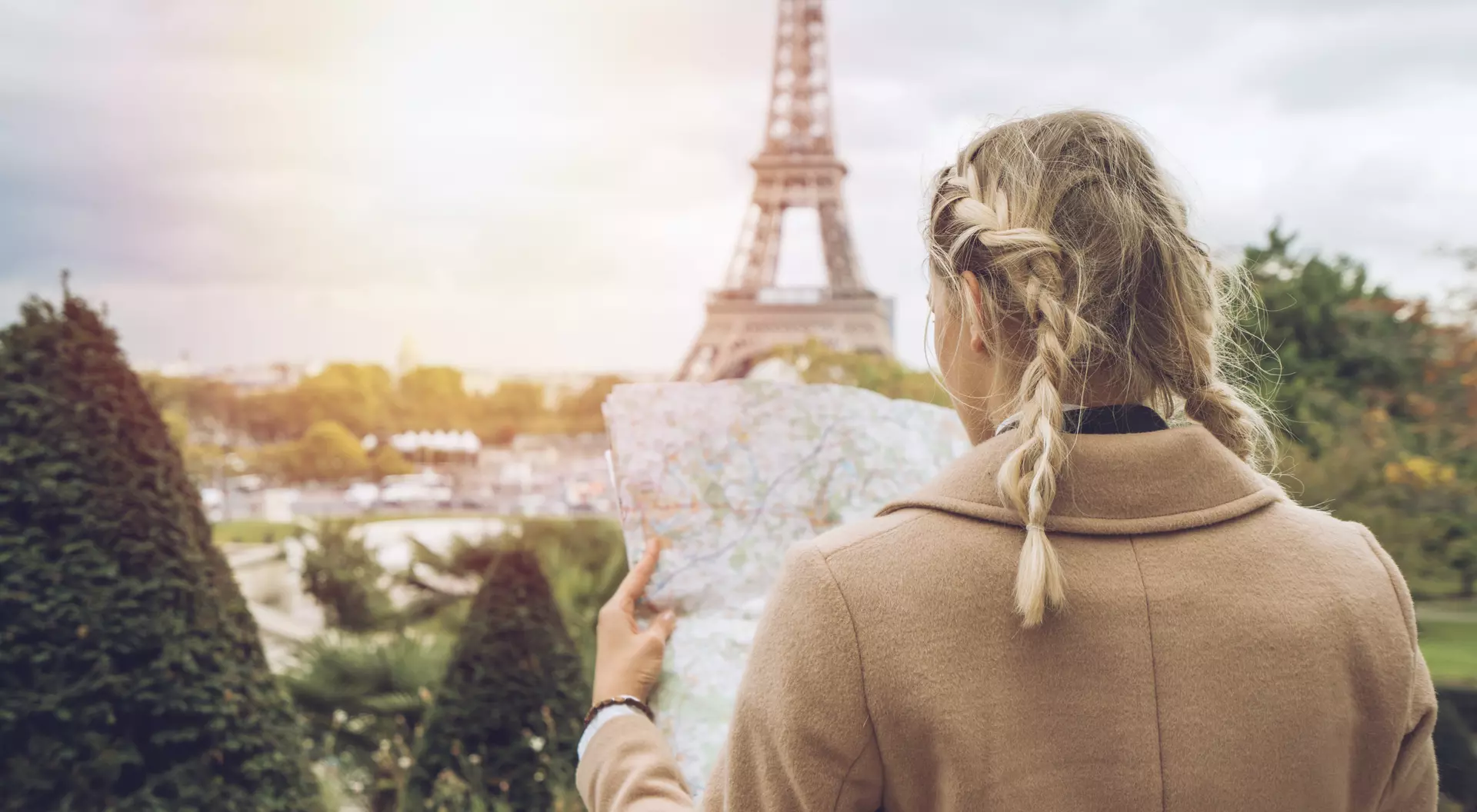 Paris, France Tourist female in Paris at the Eiffel Tower