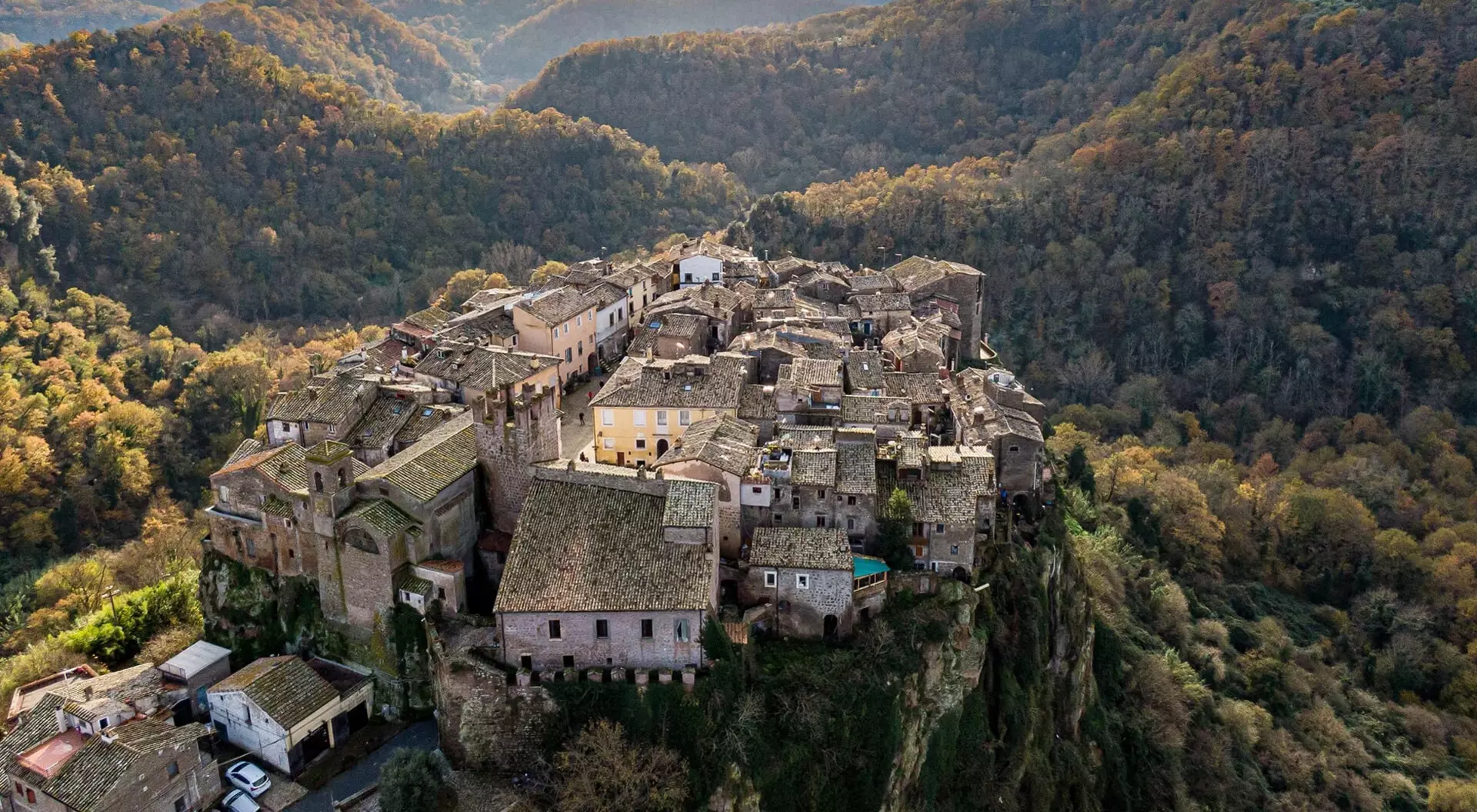 overhead view of medieval town on cliff top