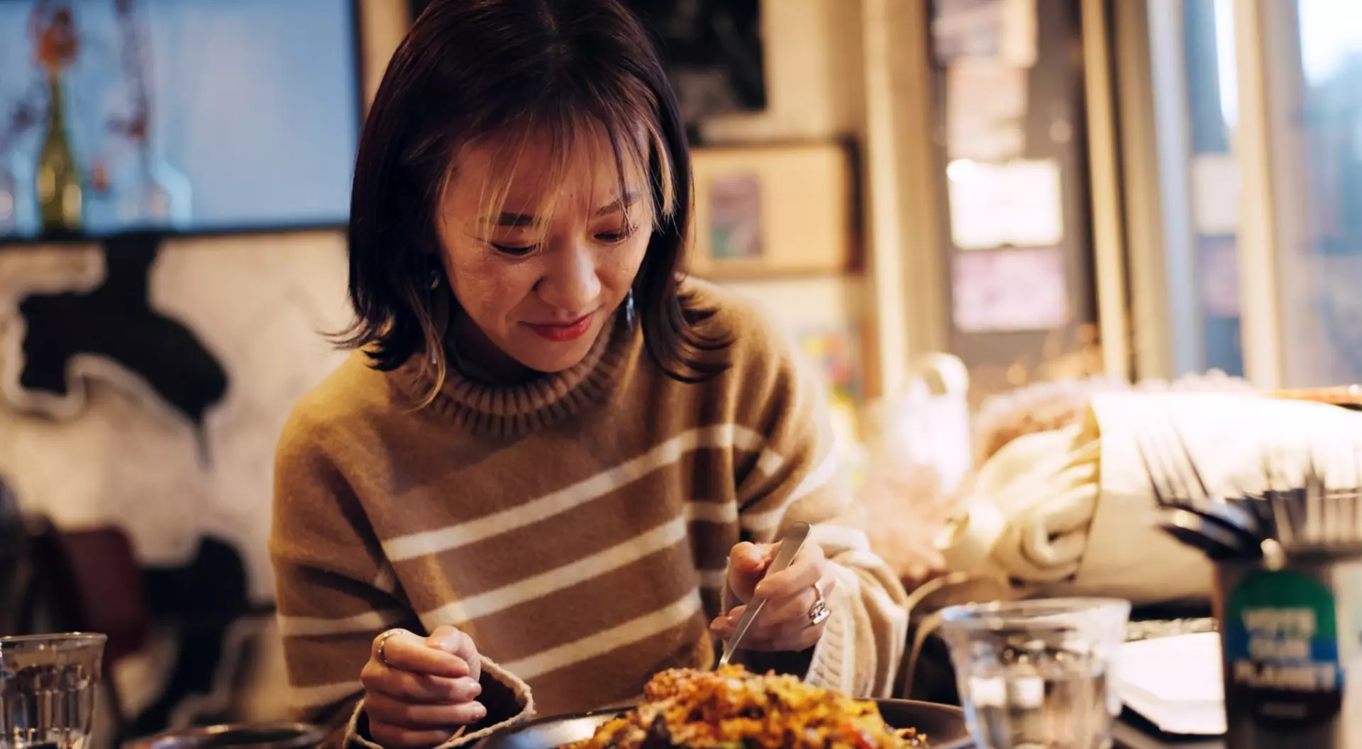 Tokyo, Japan woman at a restaurant eating a meal